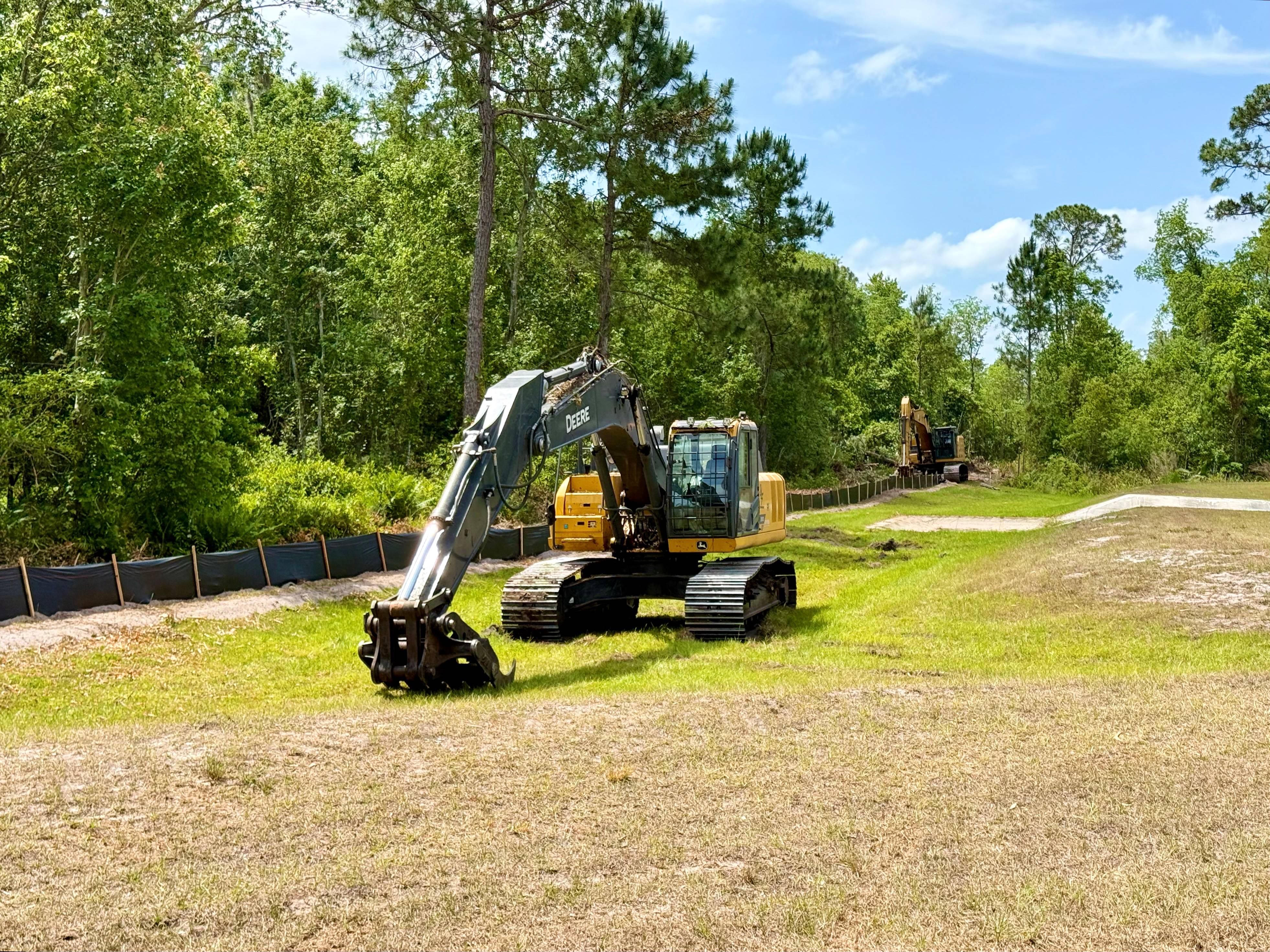 Construction Equipment and Land Clearing Behind Magic Kingdom for Cars Expansion