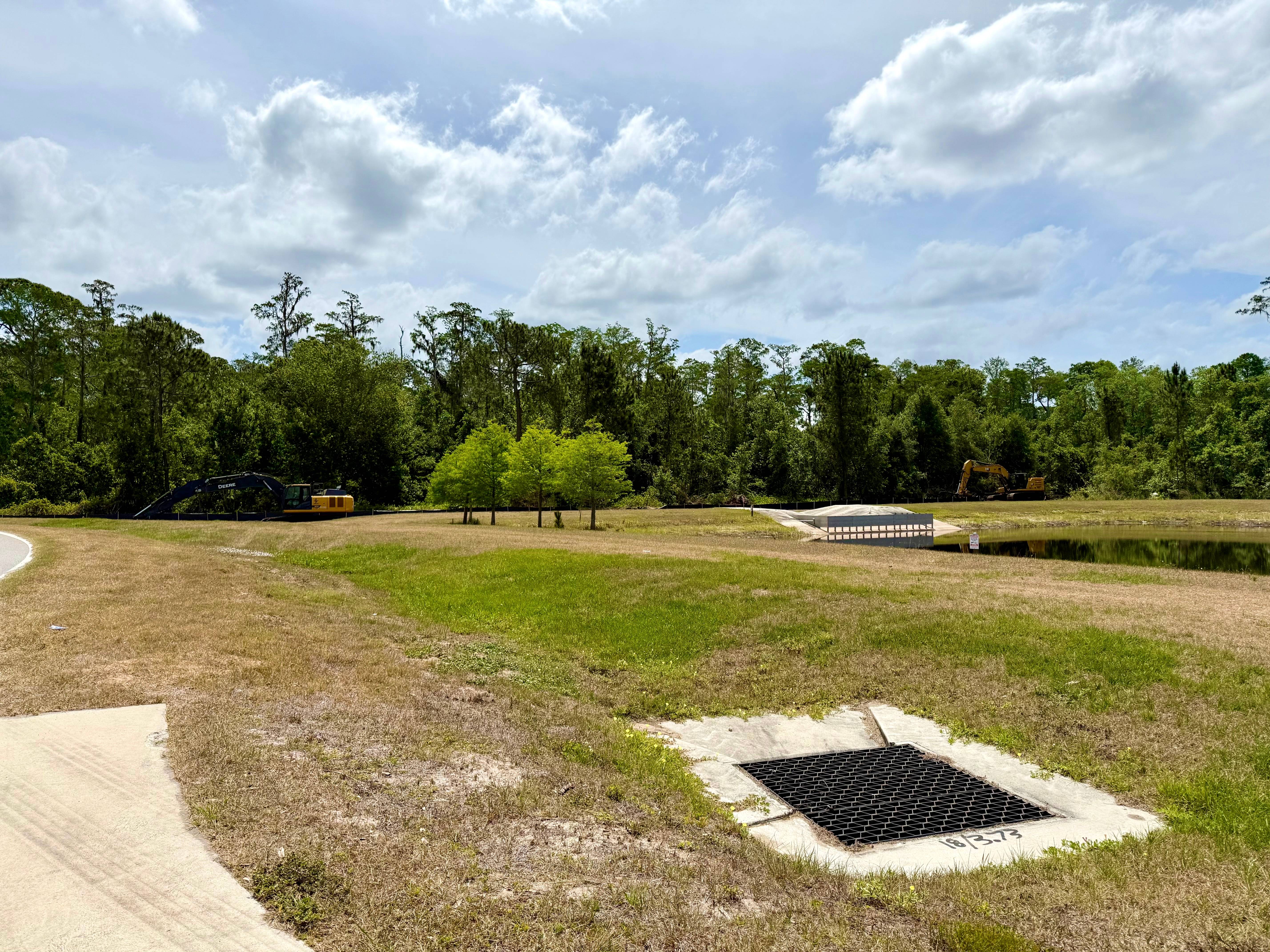 Construction Equipment and Land Clearing Behind Magic Kingdom for Cars Expansion