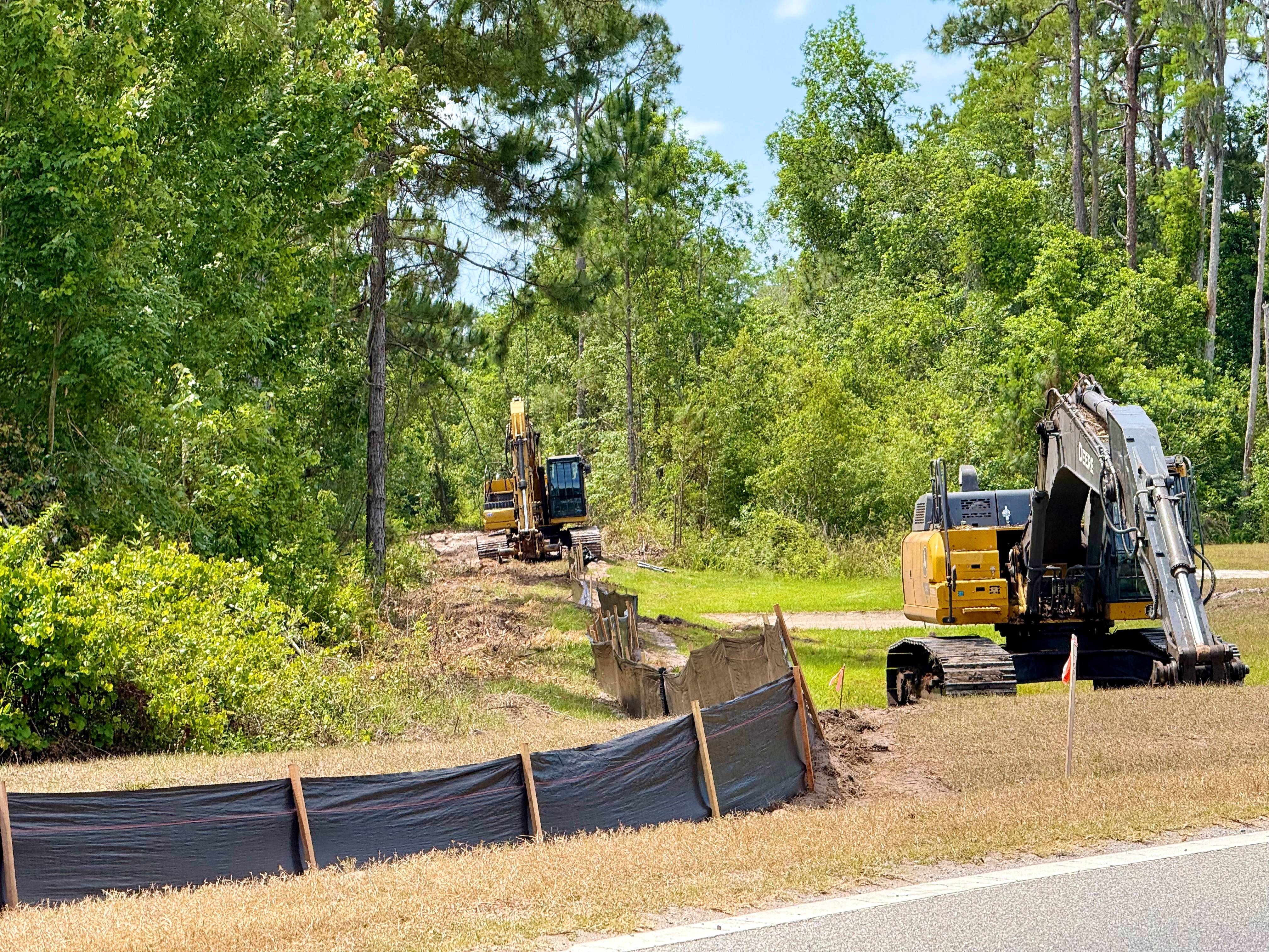 Construction Equipment and Land Clearing Behind Magic Kingdom for Cars Expansion