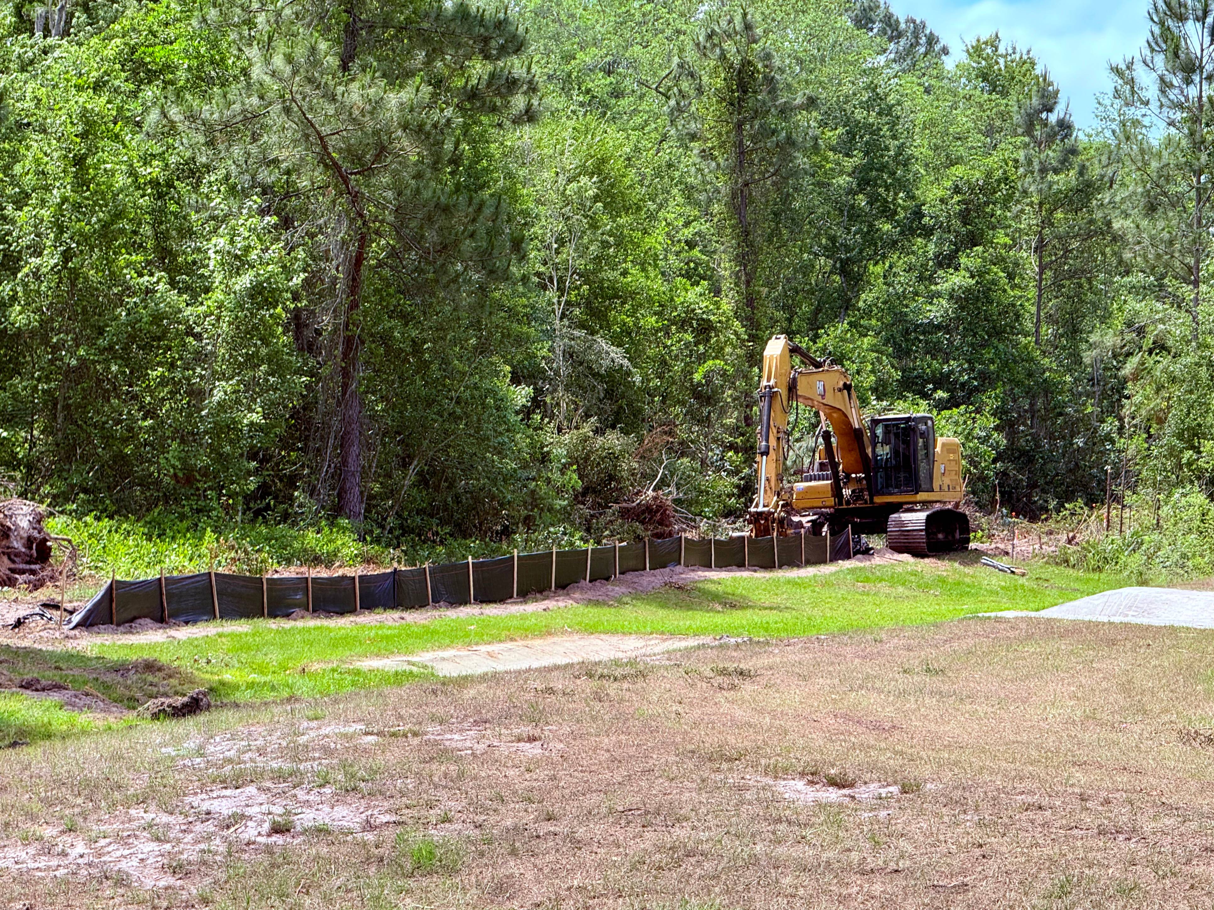 Construction Equipment and Land Clearing Behind Magic Kingdom for Cars Expansion