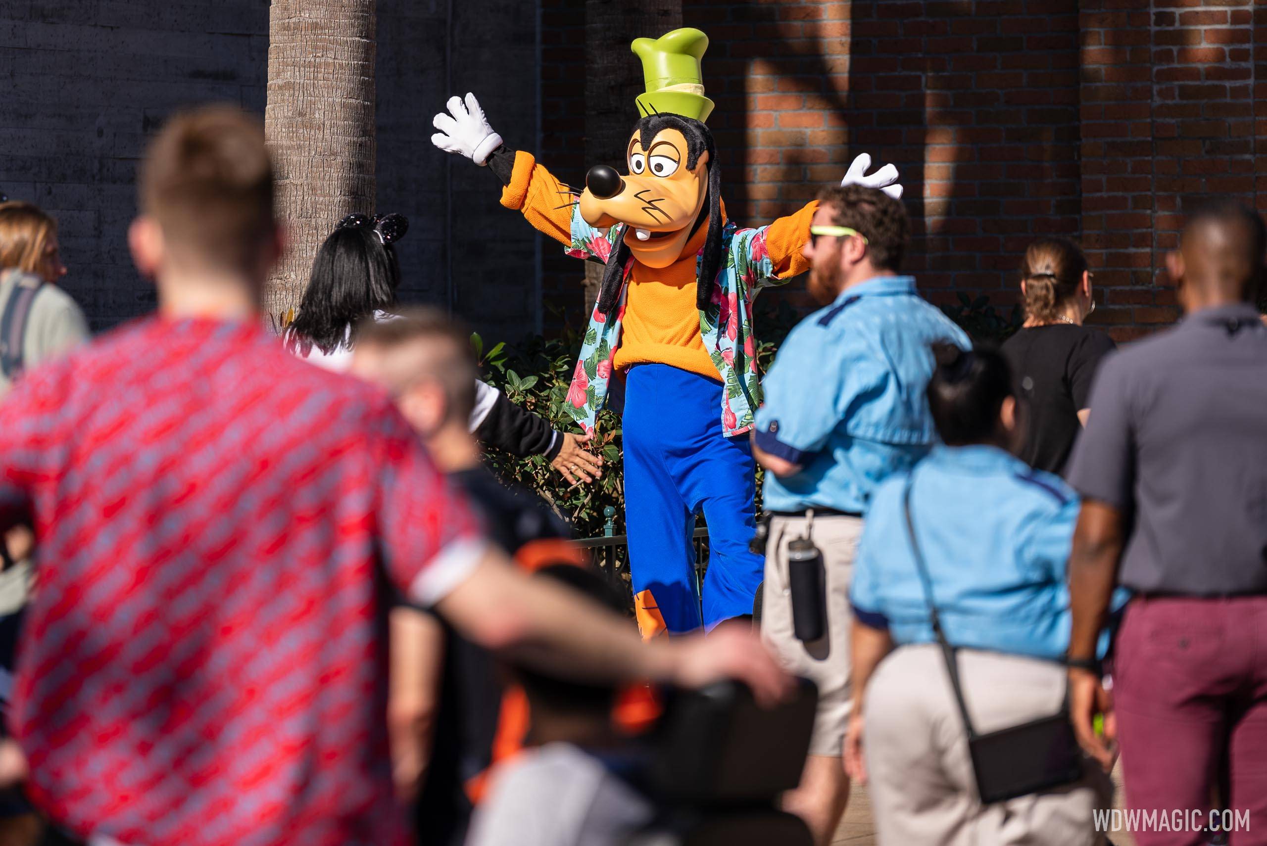 Goofy meeting guests on Grand Avenue