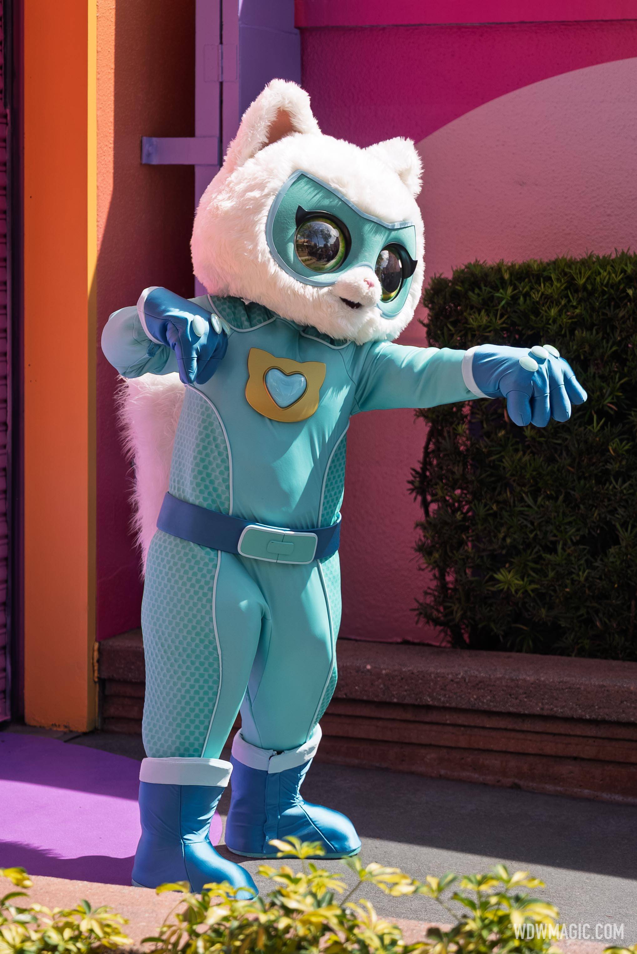 Bitsy strikes a pose in her teal superhero suit during the SuperKitties meet and greet on Commissary Lane at Disney's Hollywood Studios