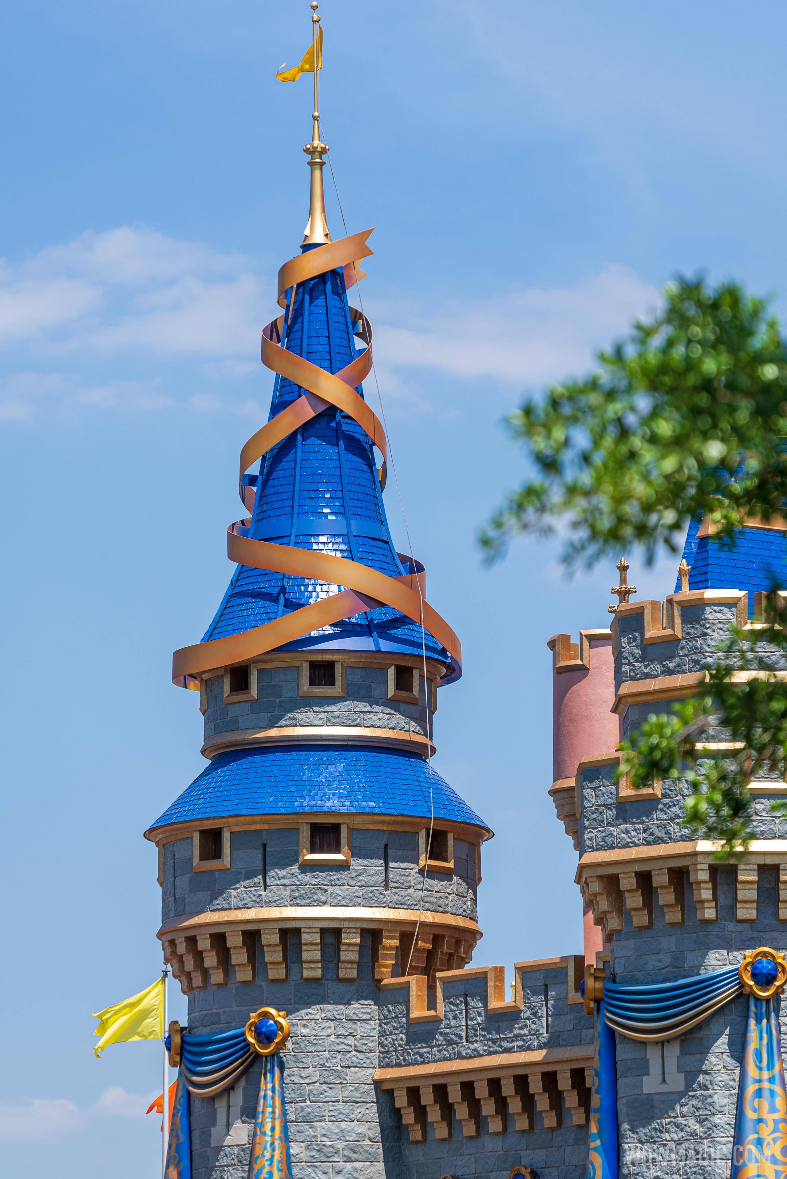 First ribbon installed on the spire of Cinderella Castle - April 7 2021