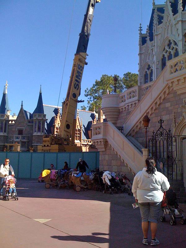 Crane now on-site at Cinderella Castle for Dream Light removal