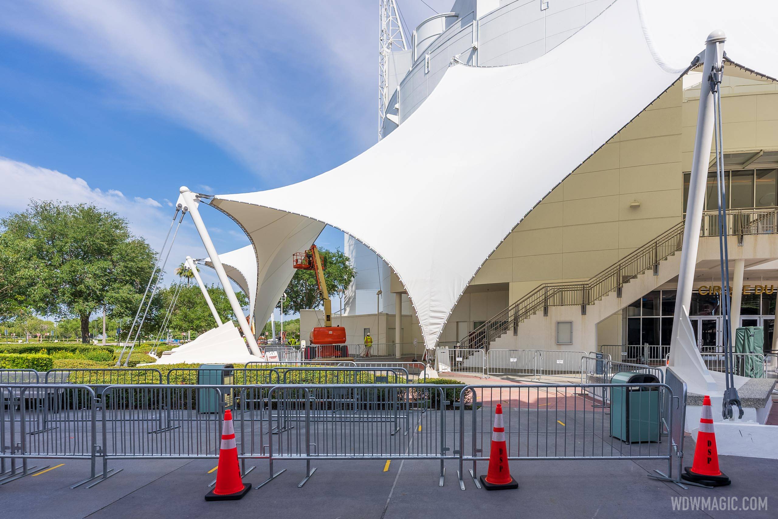 Repainting gets underway on the Cirque du Soleil theater at Disney Springs