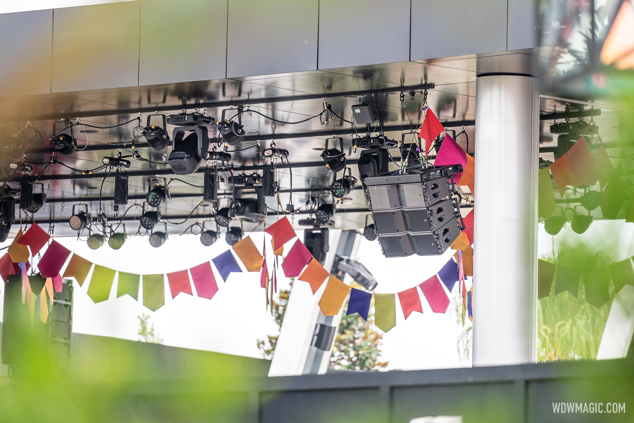 Colorful Banners, Lighting, and Speakers Installed at CommuniCore Plaza for New Encanto Show
