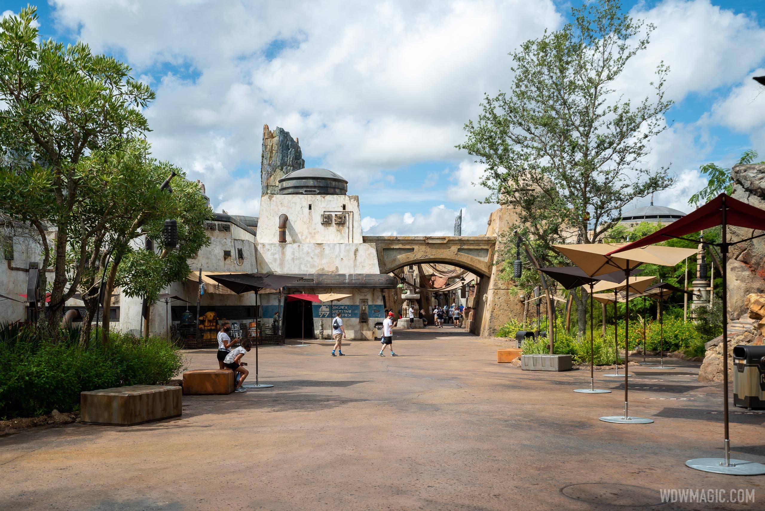 Guests at the Toy Story Land entrance to Galaxy's Edge