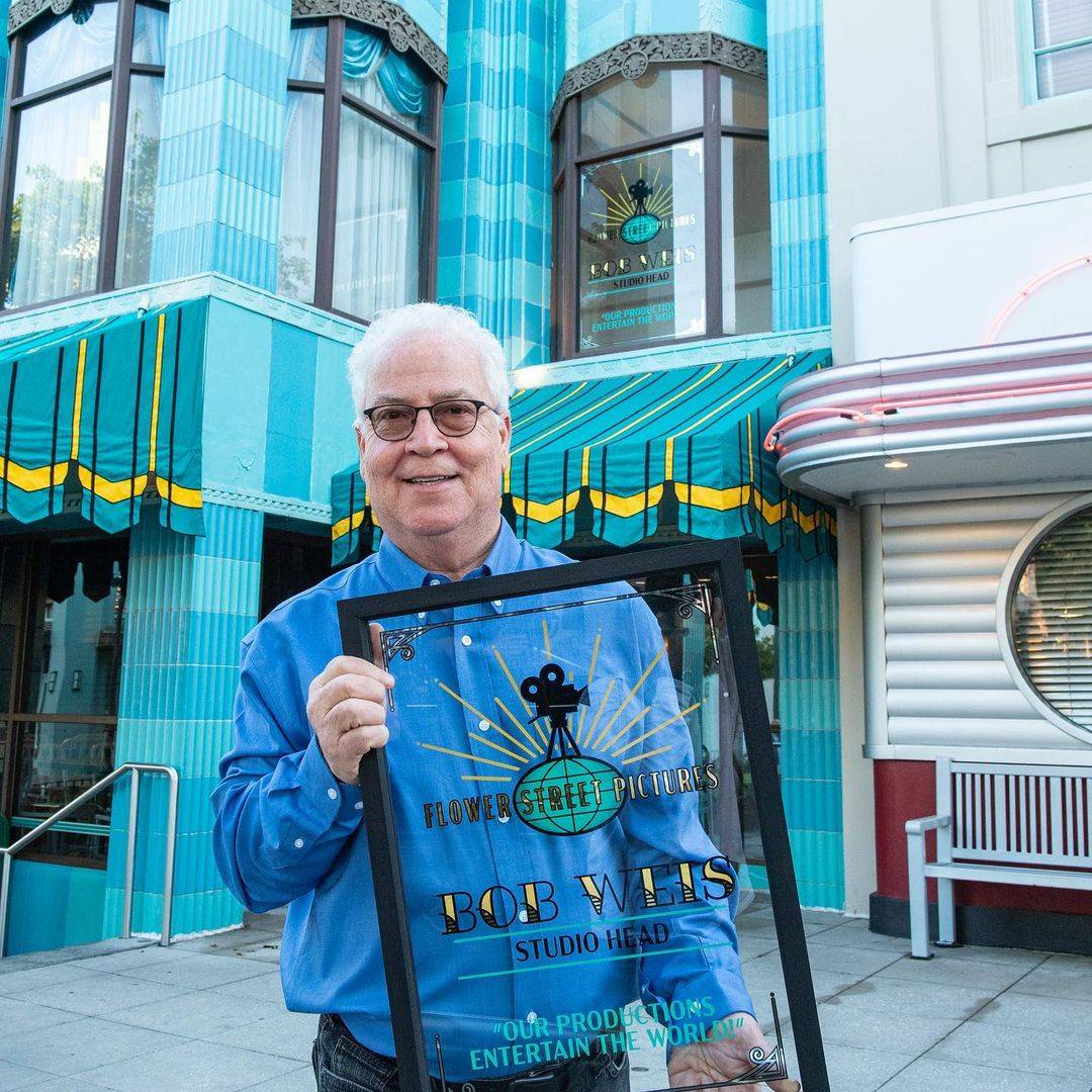 Former Walt Disney Imagineering president Bob Weis receives a window at Disney's Hollywood Studios