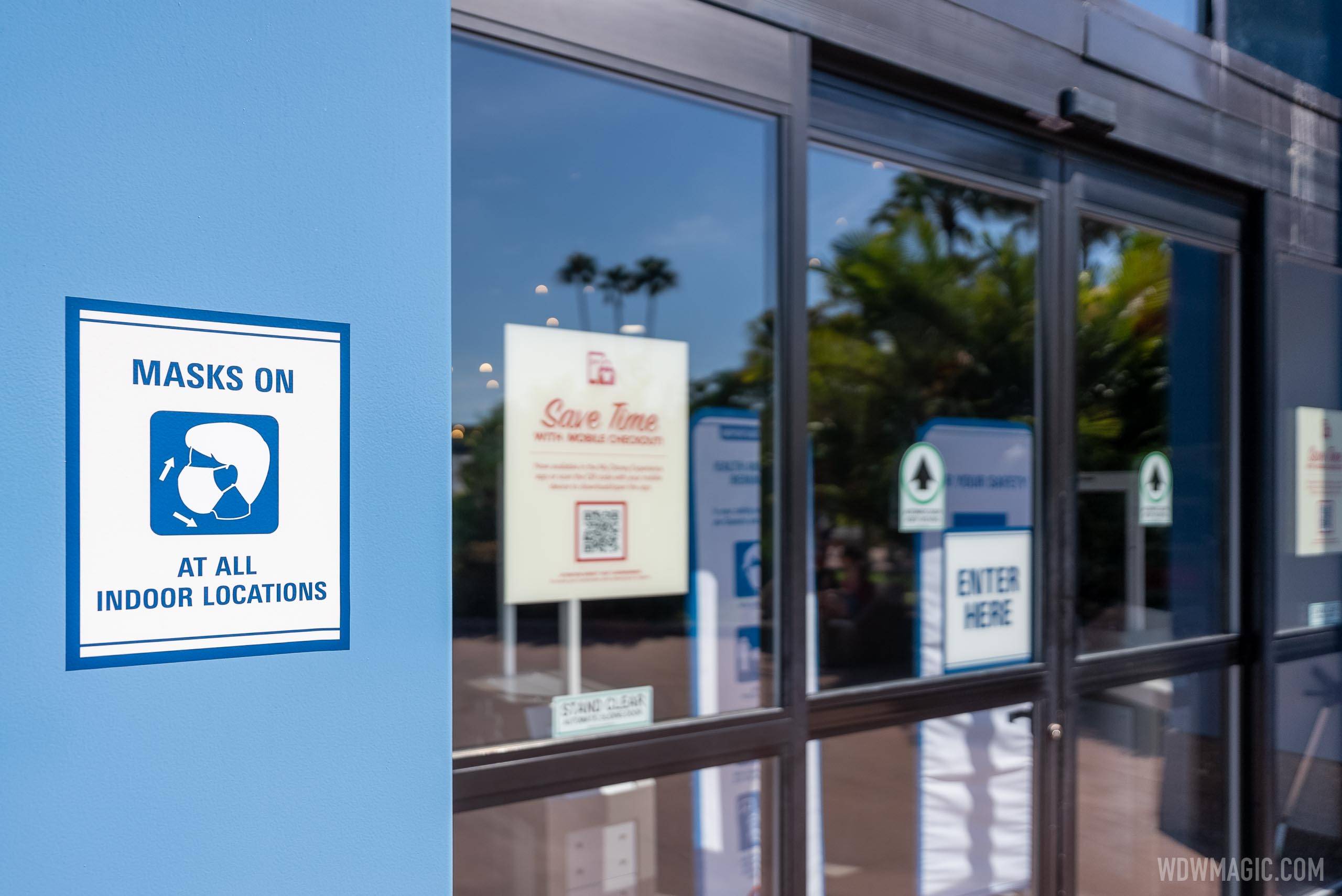 Masks On' sign outside Mouse Gear in Future World at EPCOT
