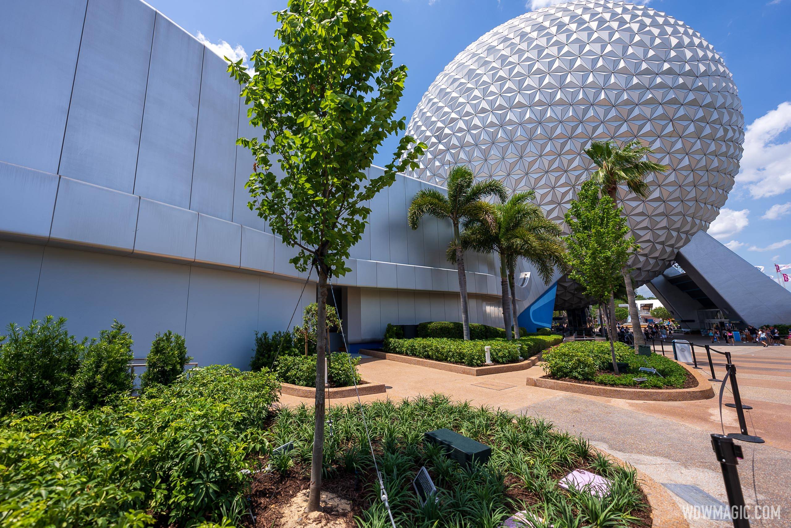 Construction walls removed near Spaceship Earth revealing new landscaping