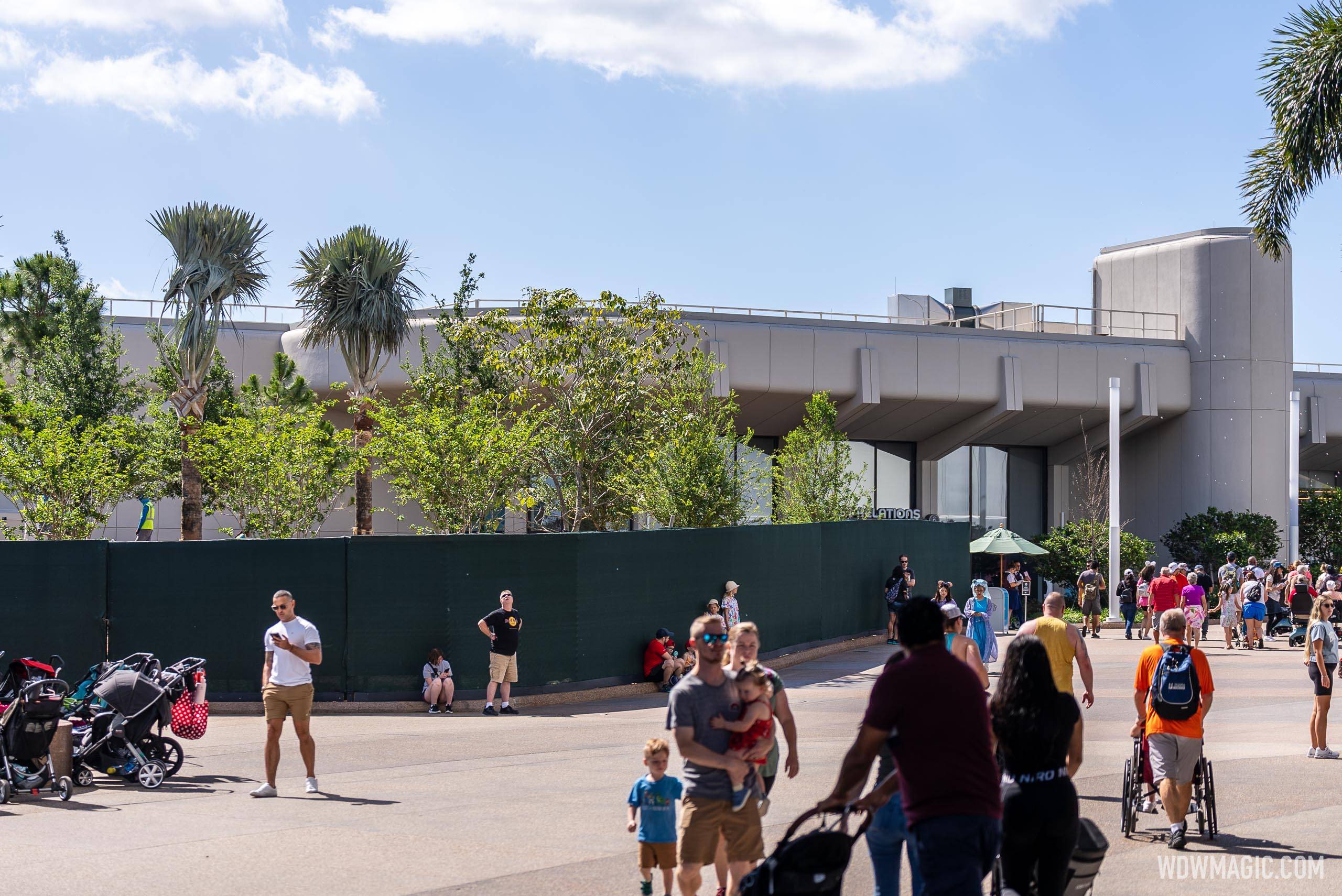 New landscaping arrives in the long-vacant area near EPCOT's Guest Relations