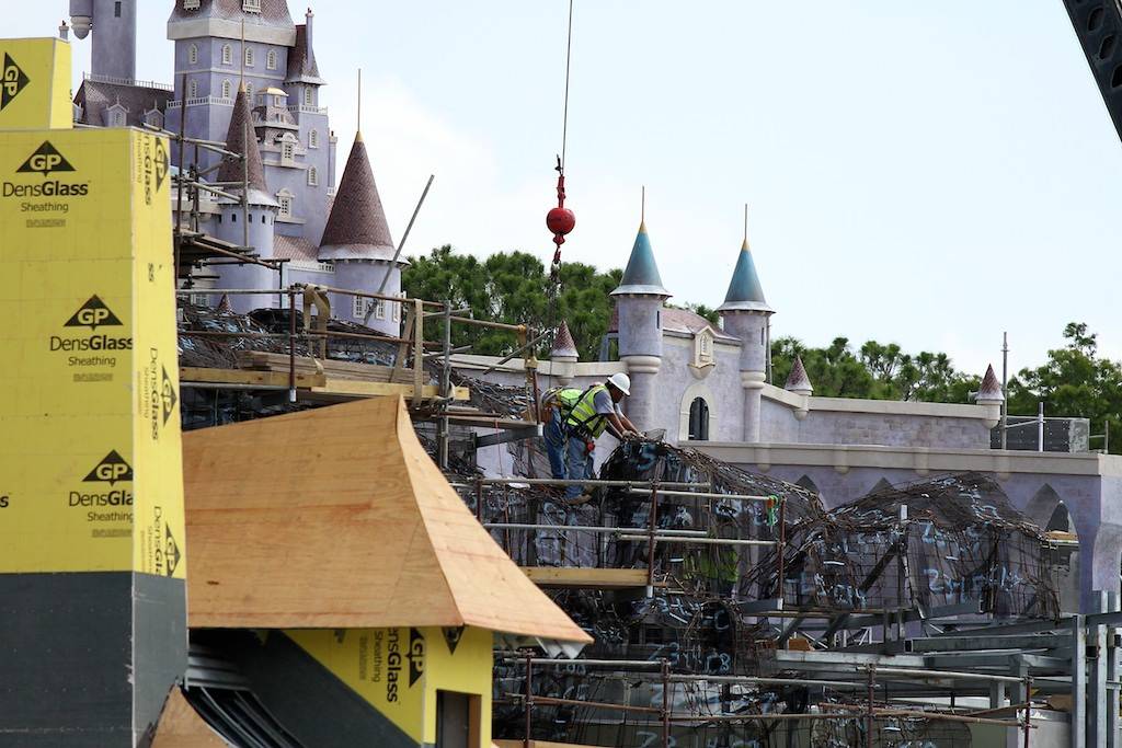 Construction crews at work on the facades