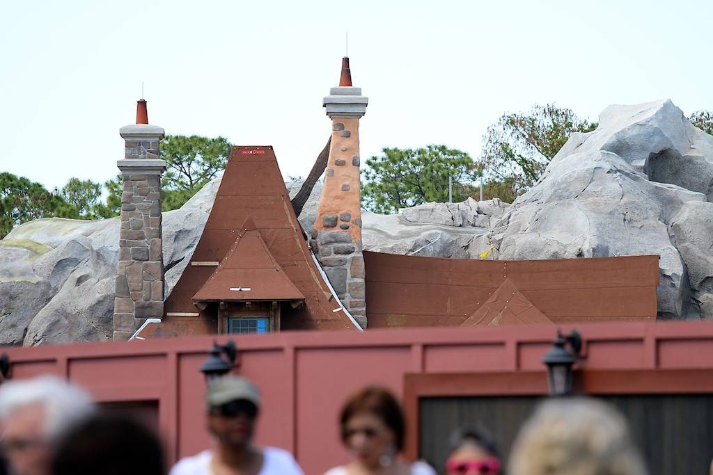 PHOTOS - Mine Train coaster rises above the construction walls in the new Fantasyland