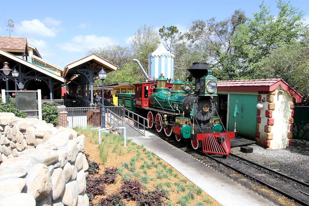 PHOTOS  - Fantasyland Train Station gets newly themed water tower and out-buildings