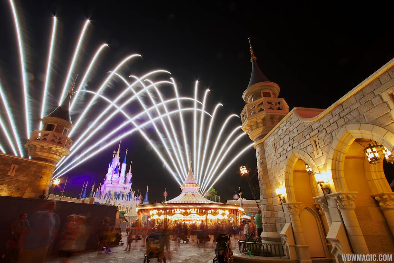 Fantasyland castle walls nighttime lighting with Wishes fireworks