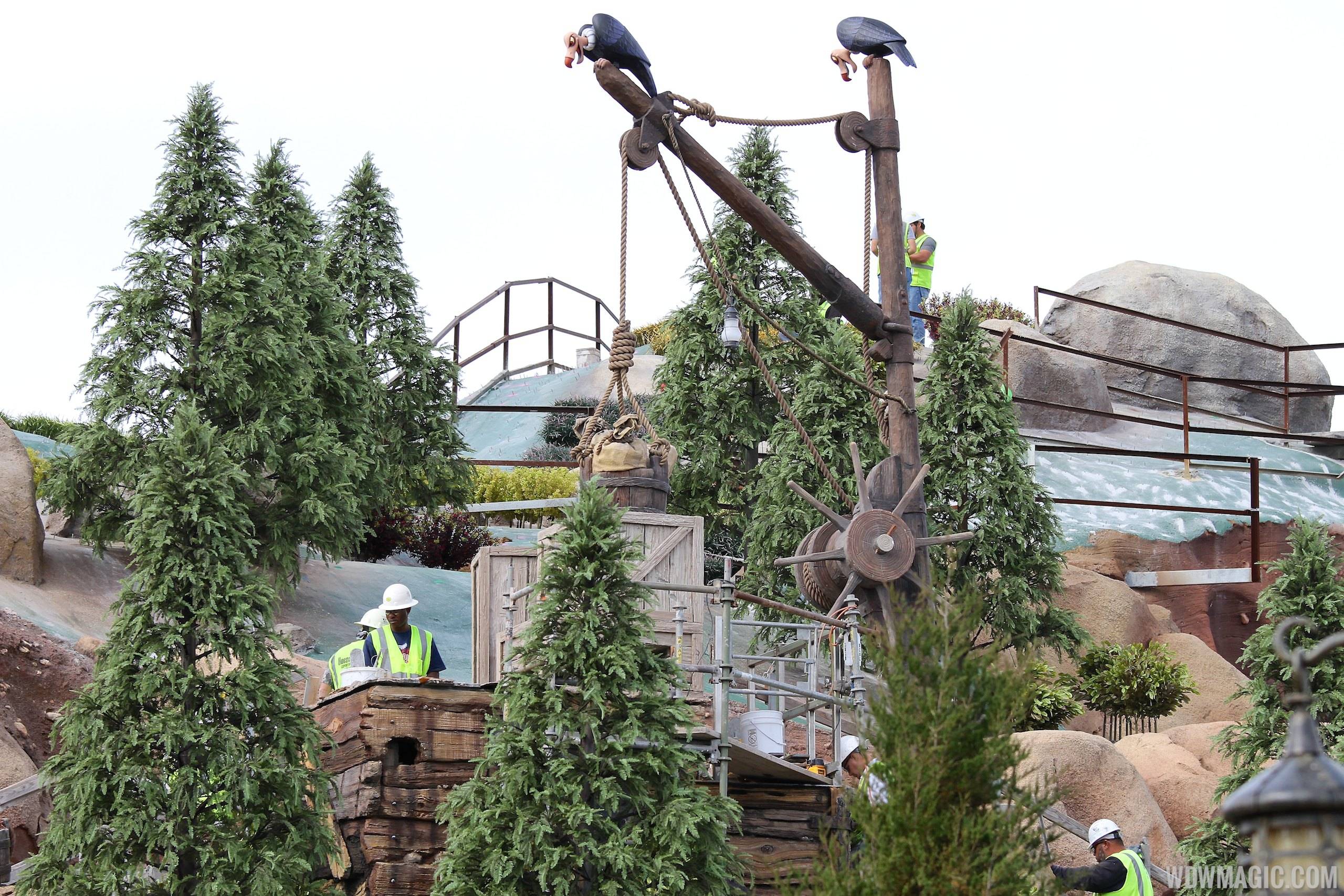 Crews working on landscaping at the Seven Dwarfs Mine Train coaster