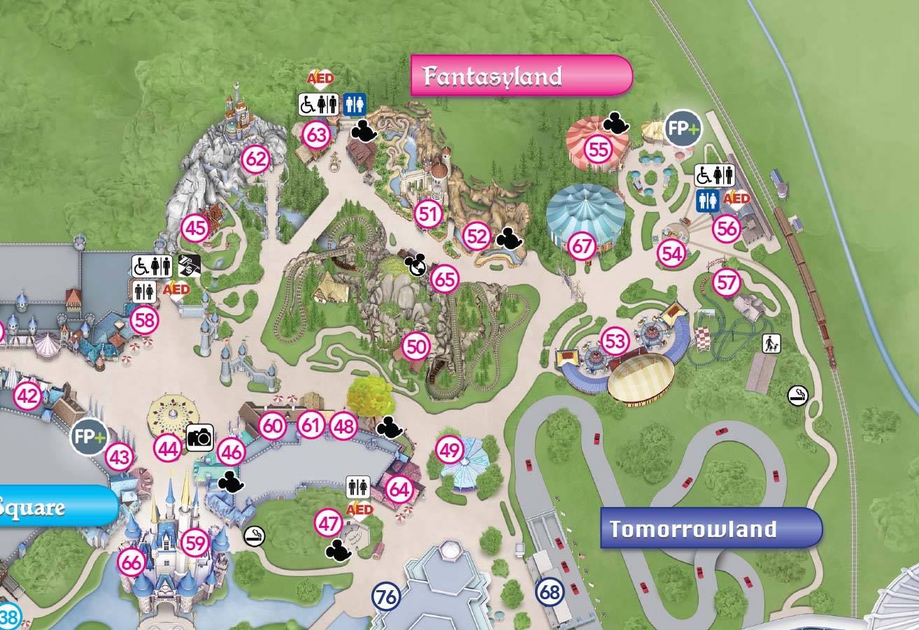 Seven Dwarfs Mine Train takes the front cover of the Magic Kingdom guide map 
