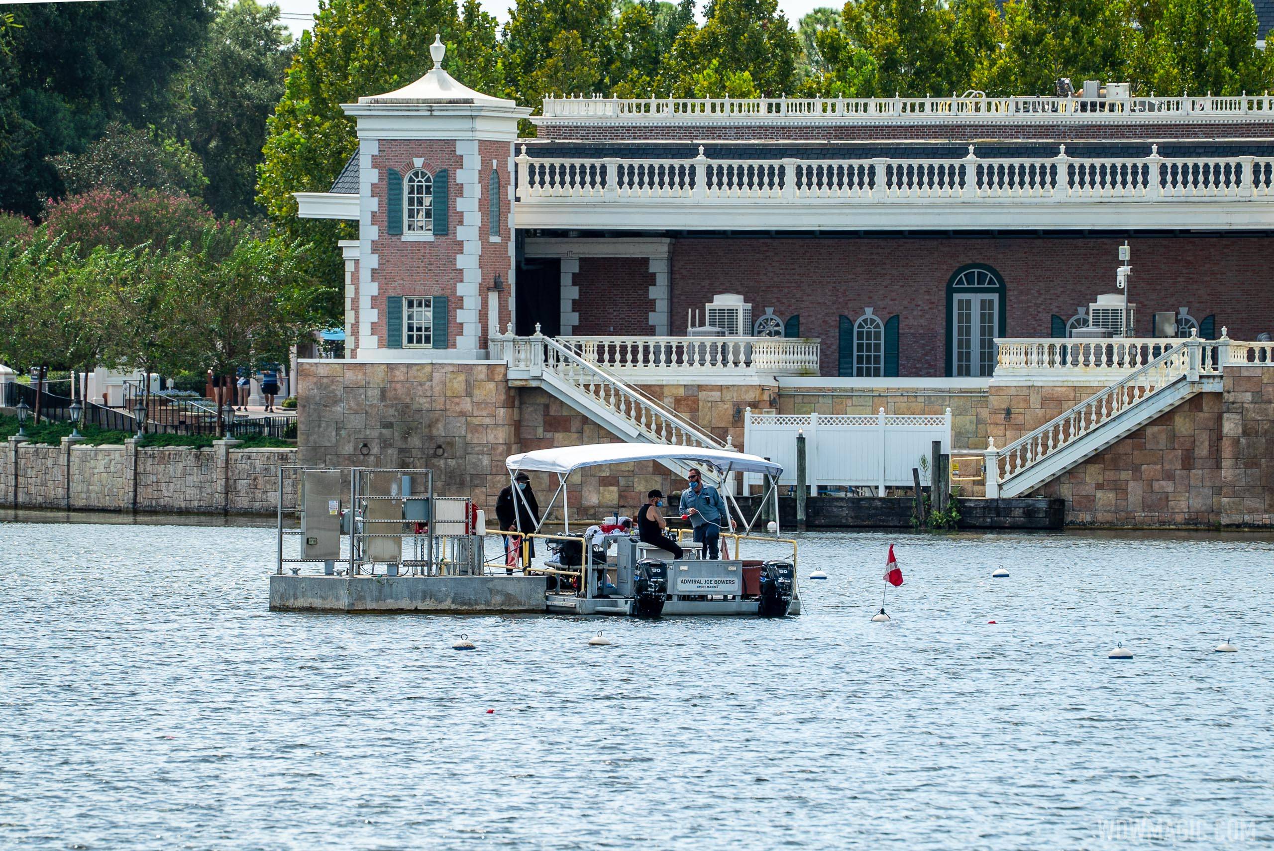 Divers in the World Showcase Lagoon