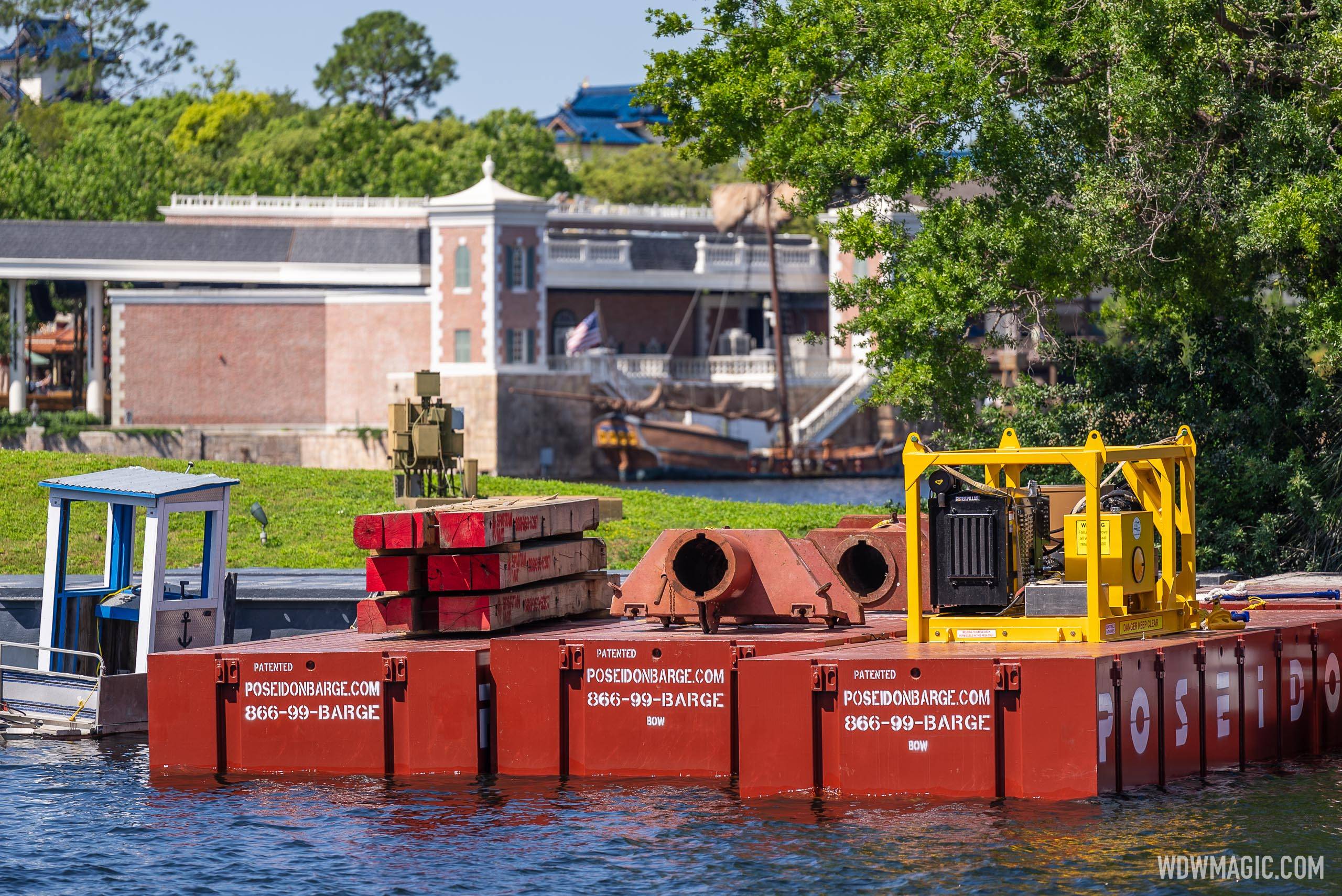Equipment is being staged in the lagoon to prepare for the new EPCOT nighttime show later in 2023