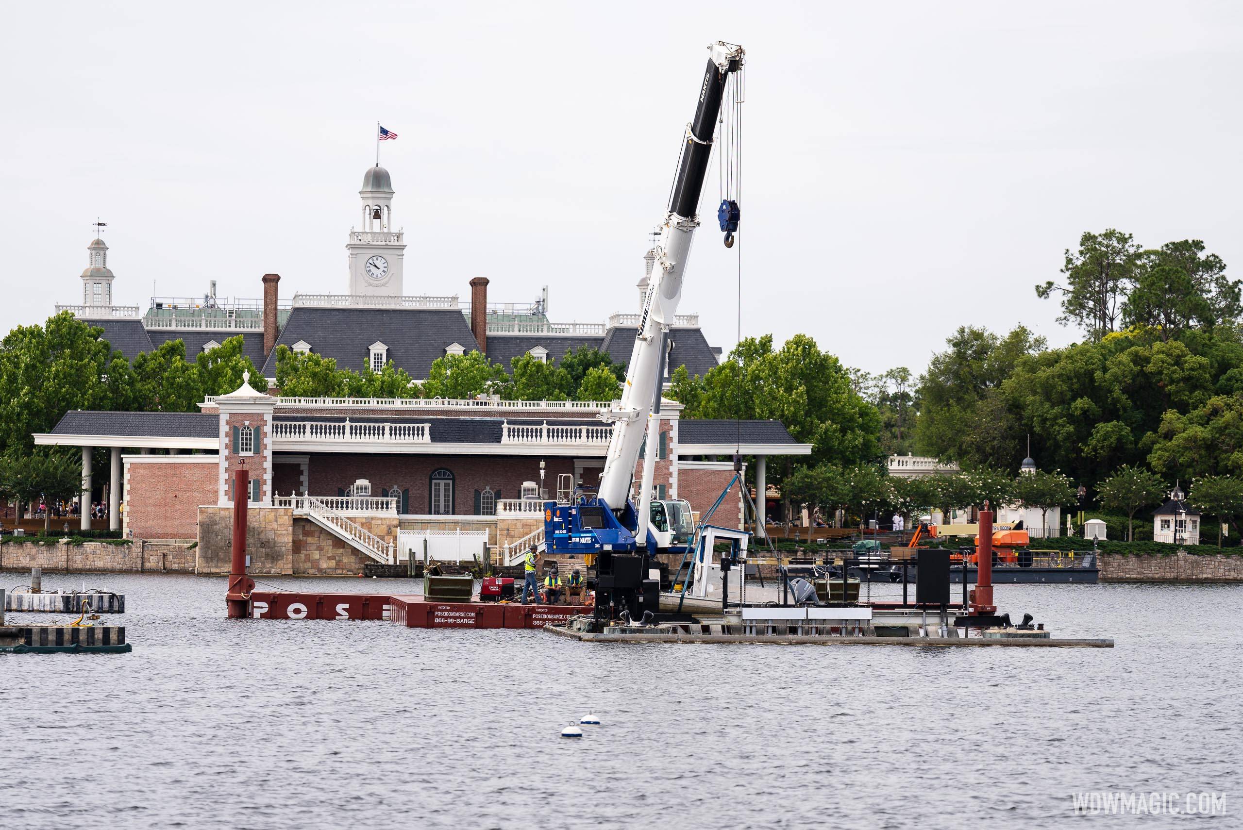Crane in the center of World Showcase for new firework show infrastructure