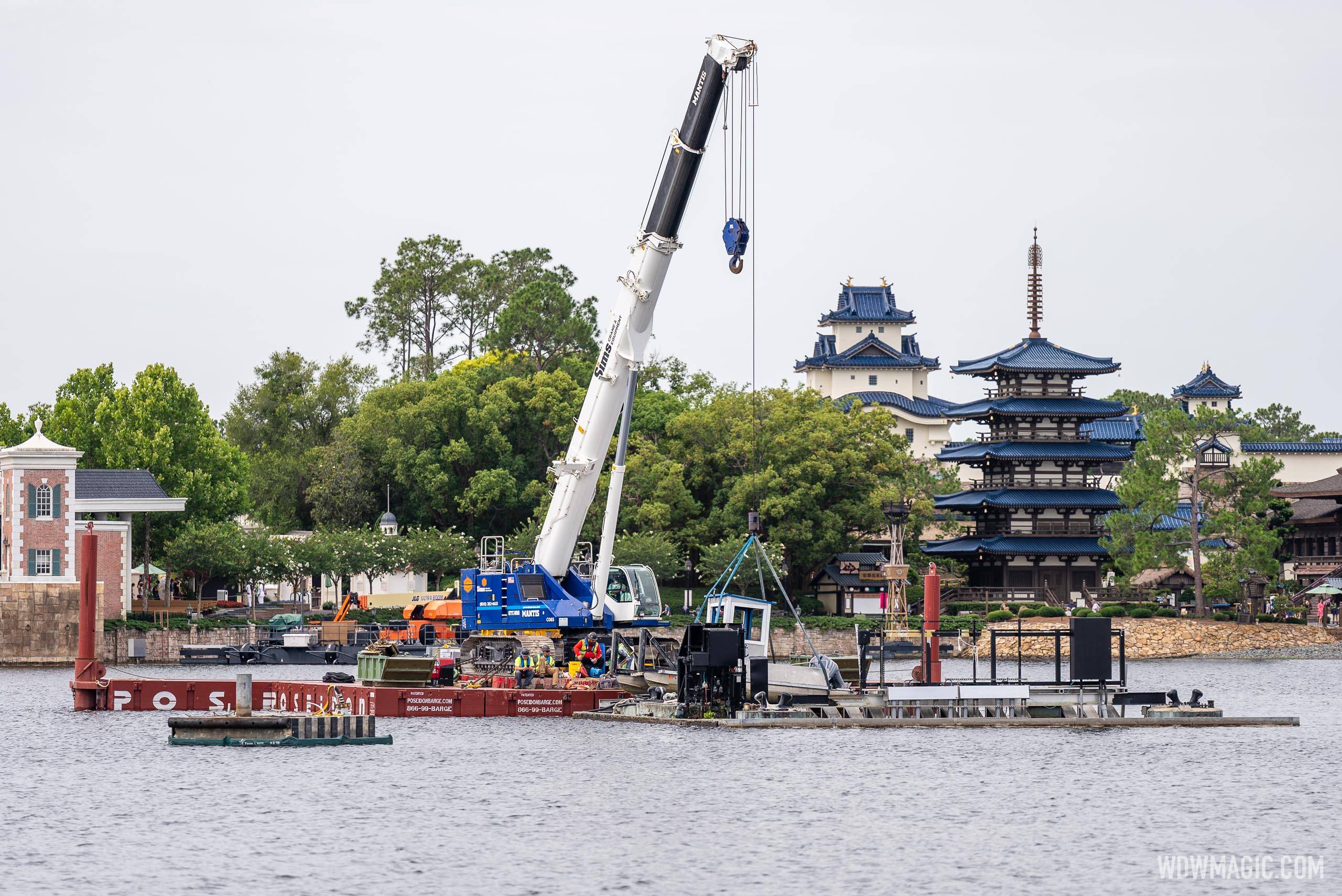 Crane in the center of World Showcase for new firework show infrastructure
