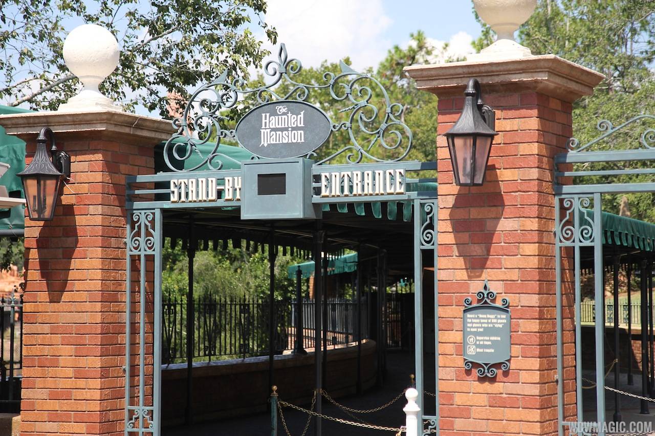 New Haunted Mansion entrance signage for FastPass and Standby lines