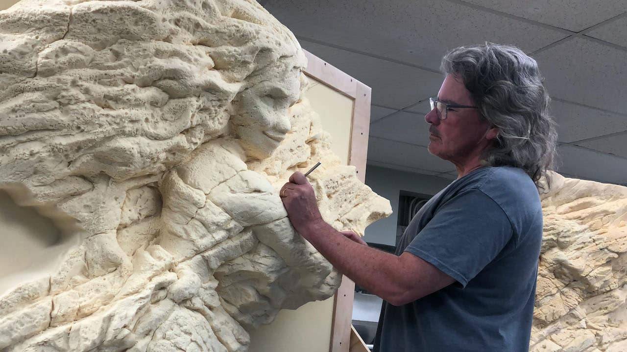 Principal Dimensional Designer, Jim Towler, sculpting the foam maquette of Moana