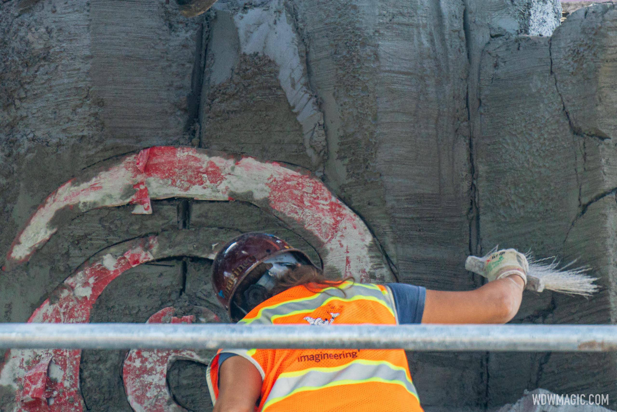Walt Disney Imagineers at work crafting the rockwork for Journey of Water Inspired by Moana.