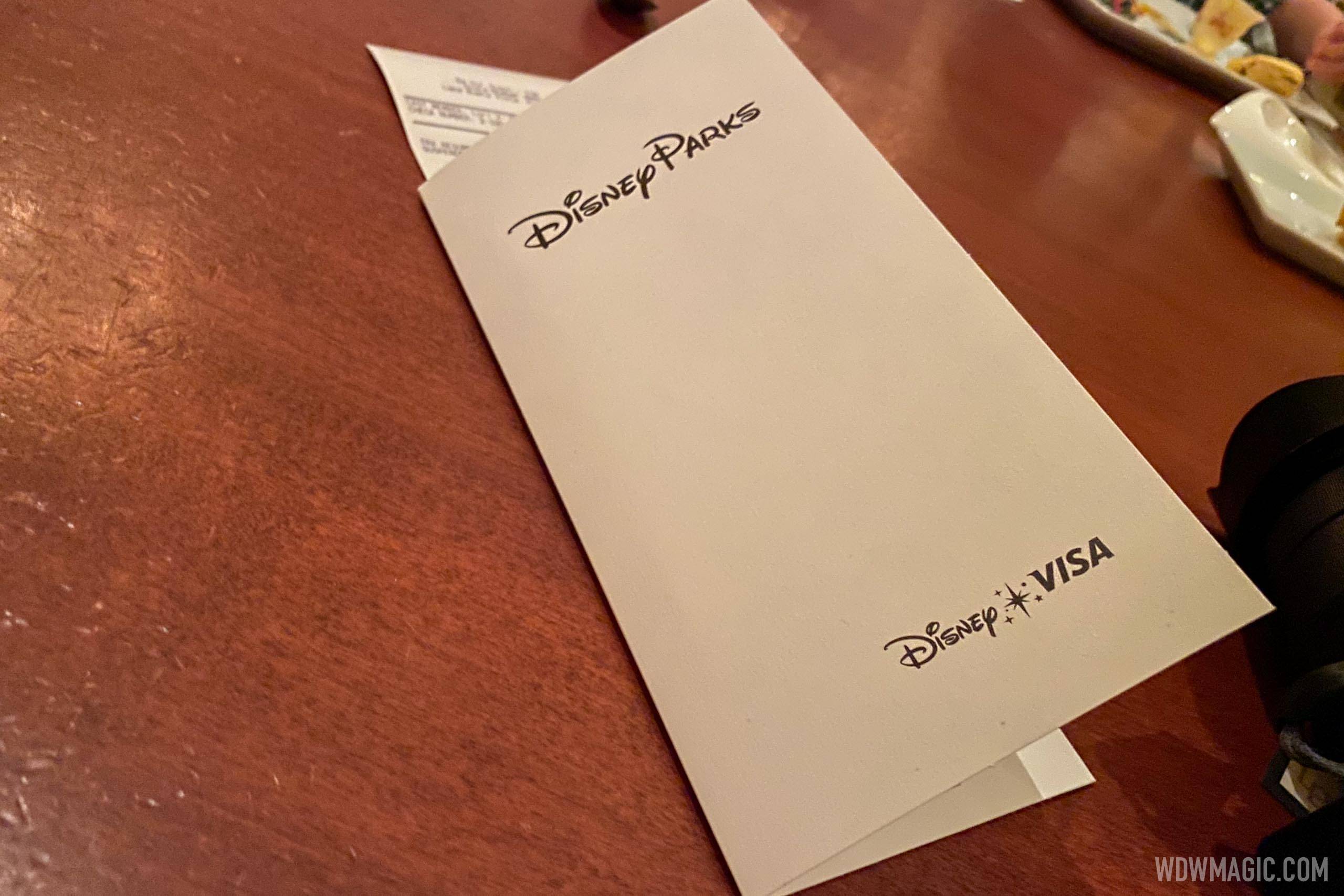 Disposable bill folder at Be Our Guest