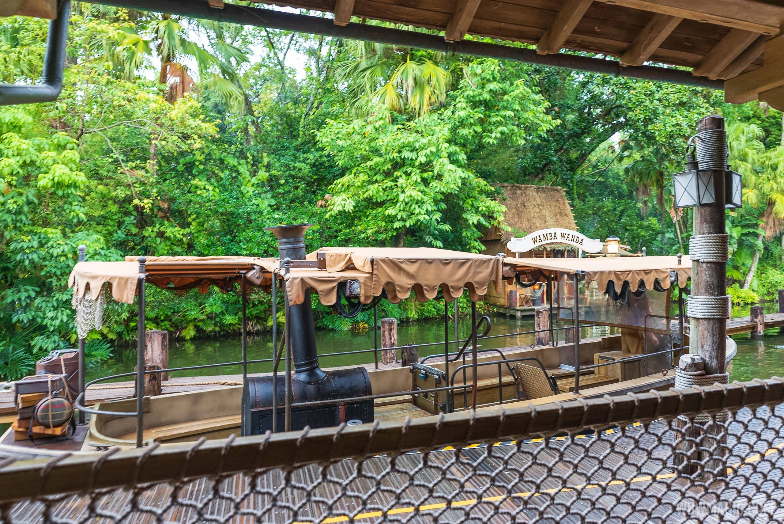 Plexiglass dividers are removed from the guest seating on the Jungle Cruise