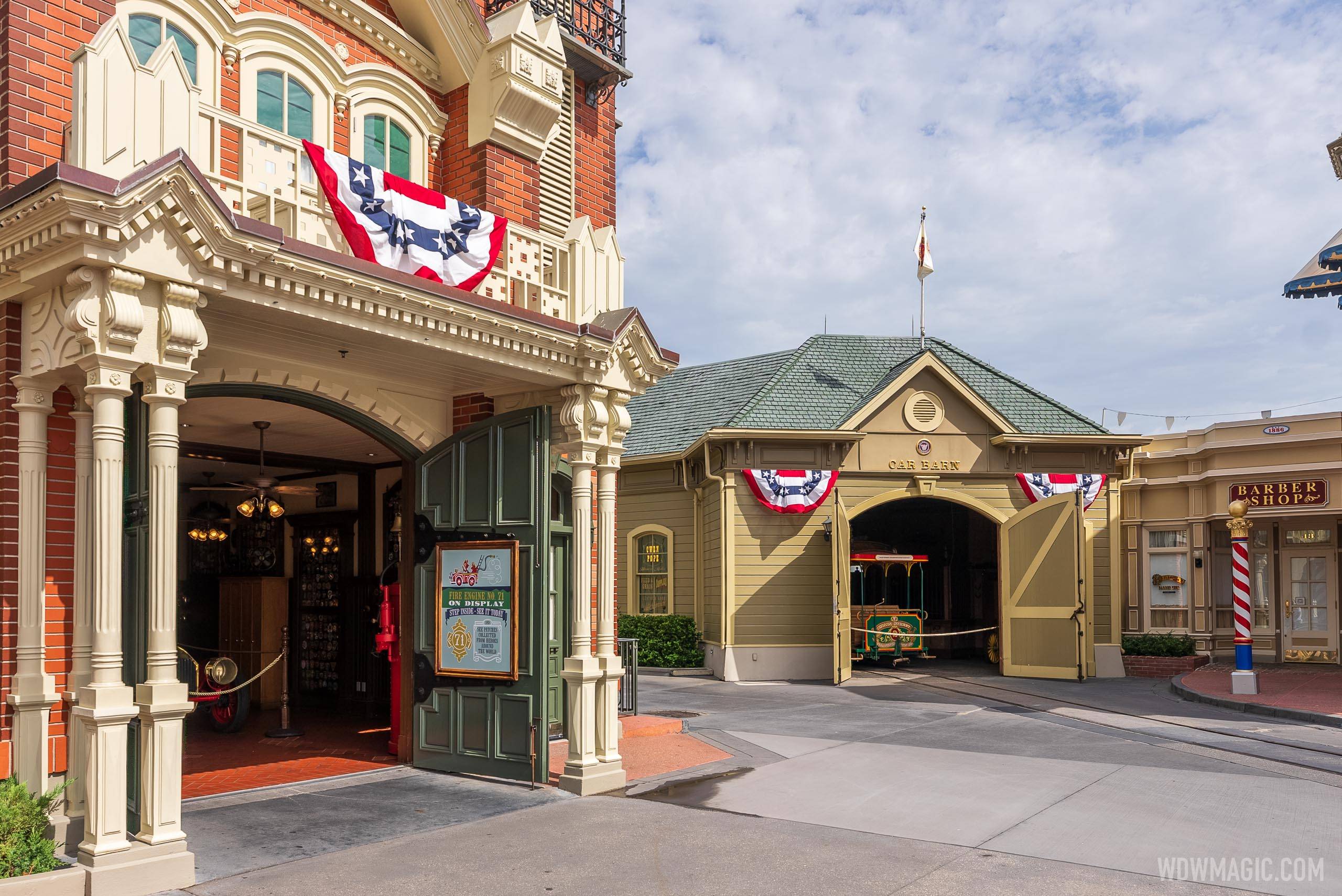 The Magic Kingdom Fire Station and Car Barn decorated for July Fourth