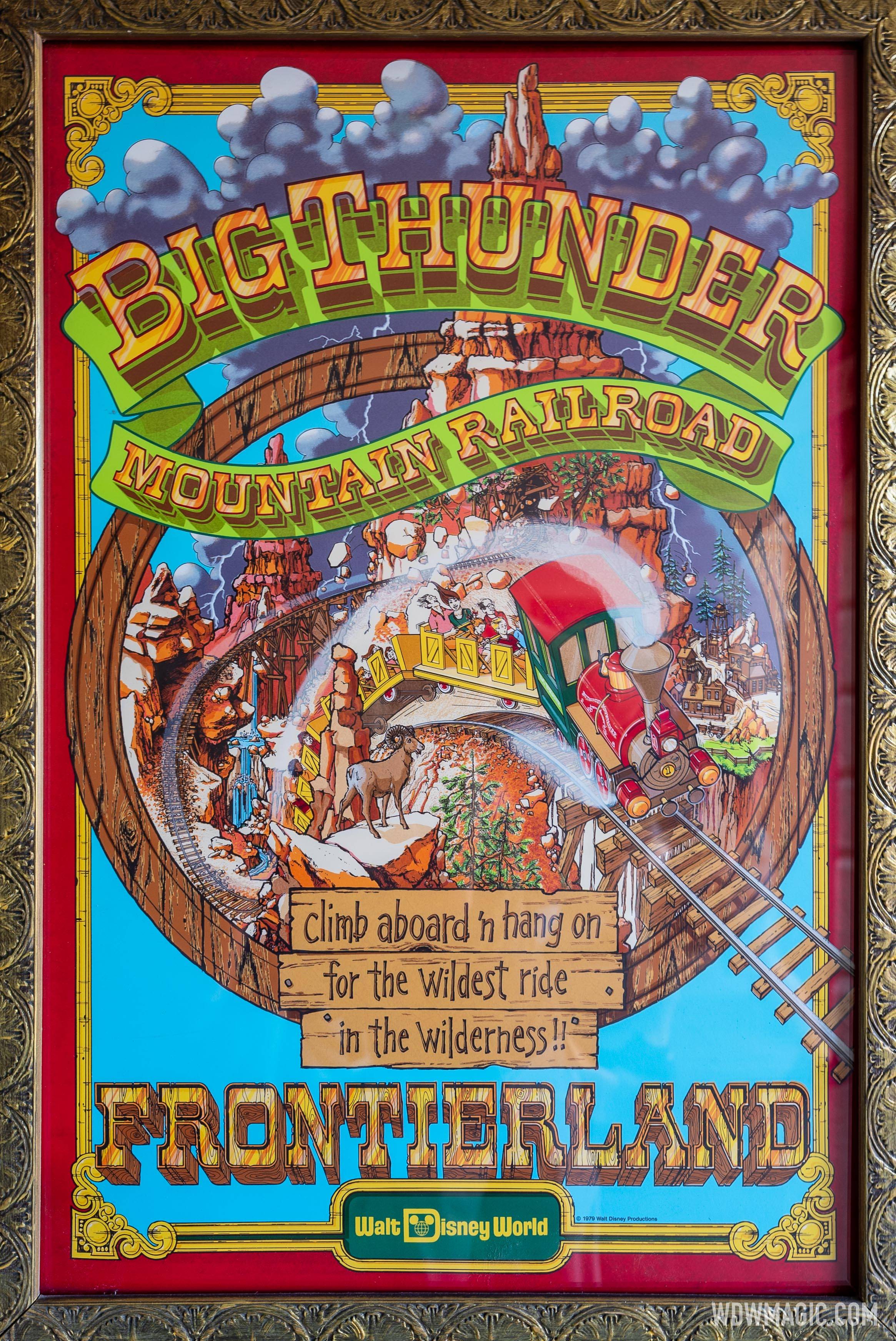 Vintage attraction posters at Magic Kingdom entrance