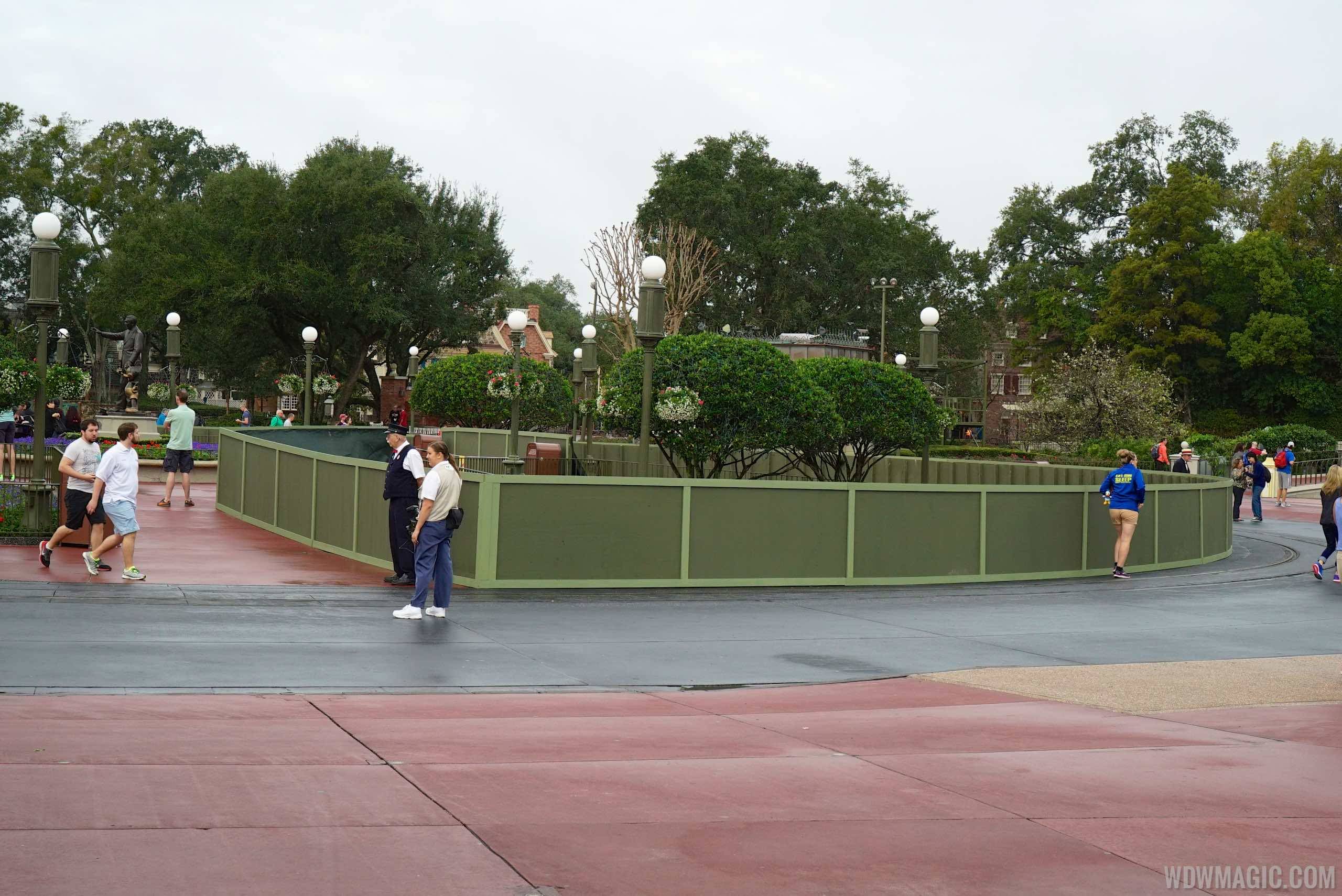 PHOTOS - Construction walls up around the center of the hub area at the Magic Kingdom