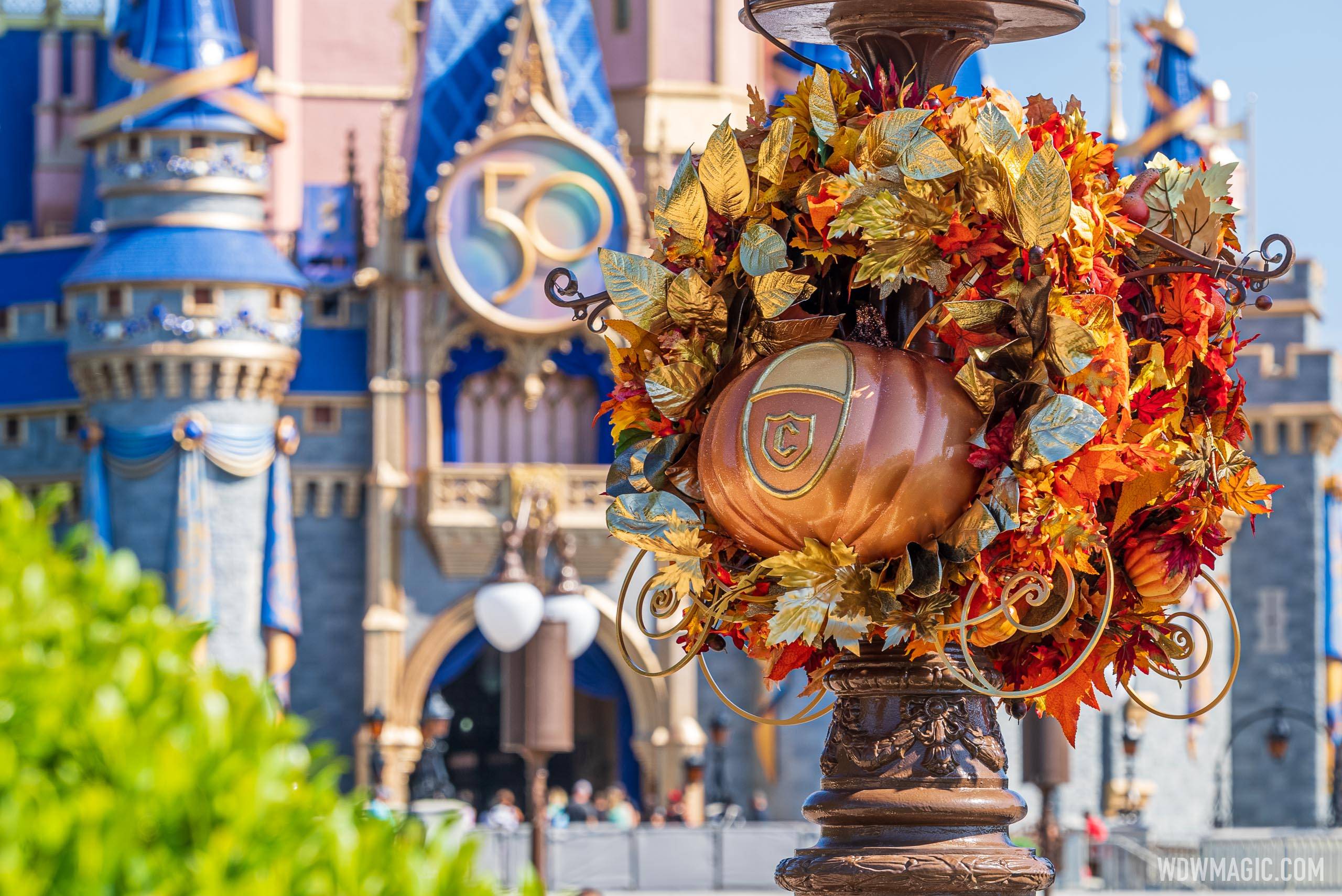 Cinderella Coach pumpkin wreaths in the hub at Magic Kingdom