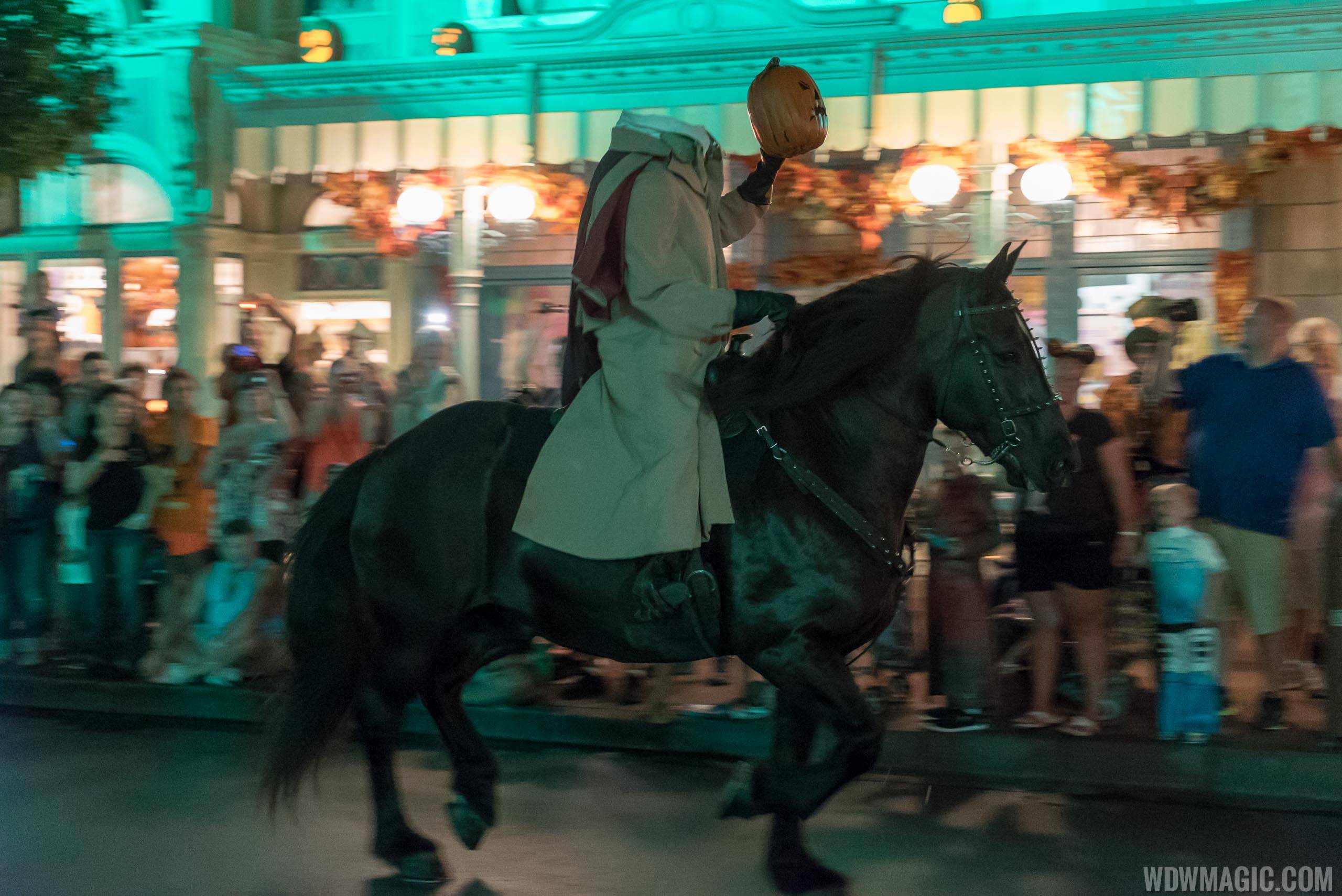 The Headless Horseman rides through the Magic Kingdom