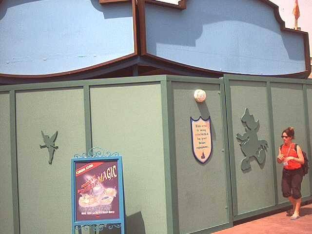Construction walls appear around the theater