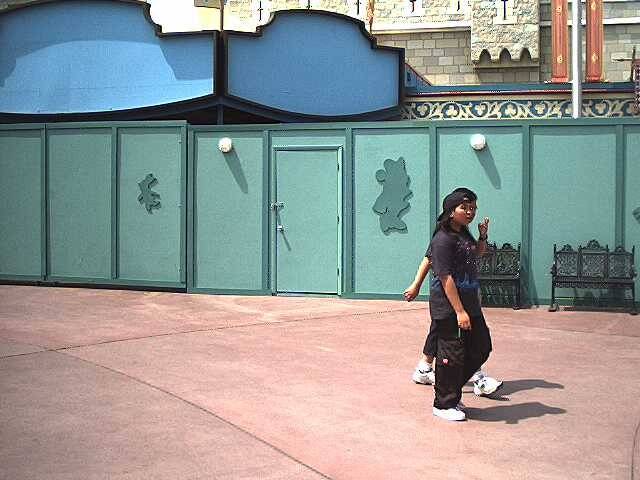 Construction walls appear around the theater