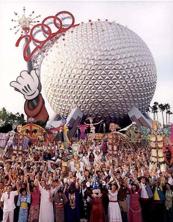 A giant wand, the Epcot Cast and Mickey Mouse