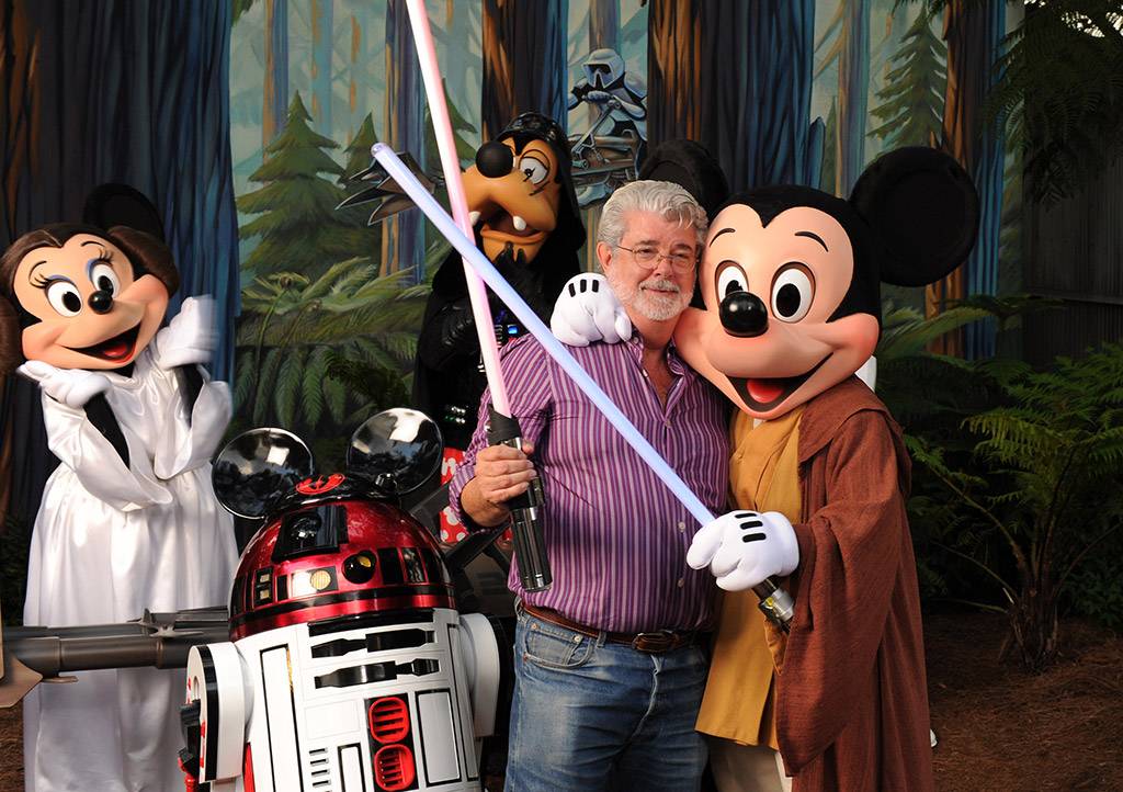 THE FUN OF THE FORCE: "Star Wars" creator George Lucas meets Jedi Mickey Mouse, Princess Leia Minnie, Darth Goofy and the loveable Disney droid R2-MK, Aug. 14, 2010 at Disney's Hollywood Studios theme park. The legendary filmmaker attended a special event at the theme park held in honor of the "Star Wars"-themed thrill attraction, Star Tours. 