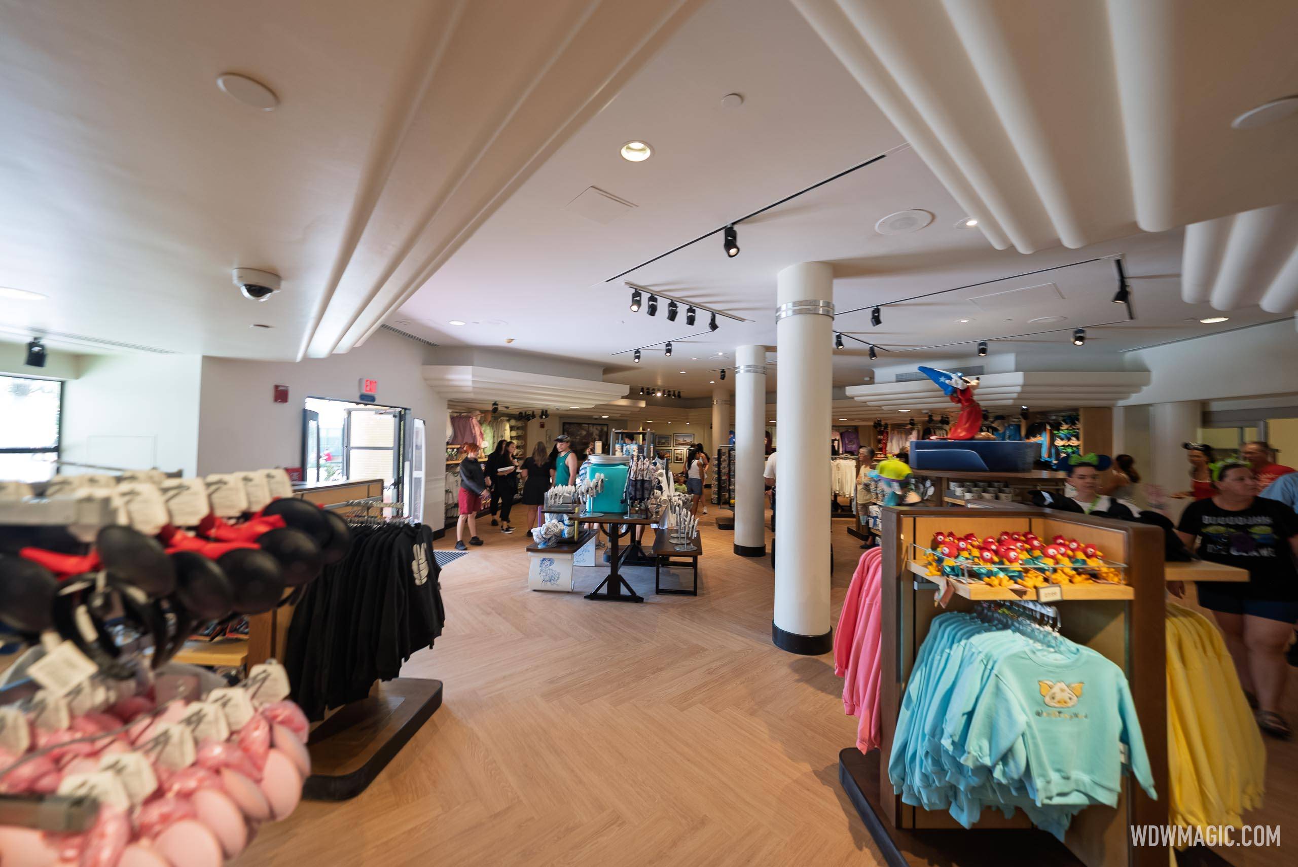 Merchandise fills the Studio Store at the Magic of Disney Animation gift shop, with apparel, Mickey ear headbands, and plush on display