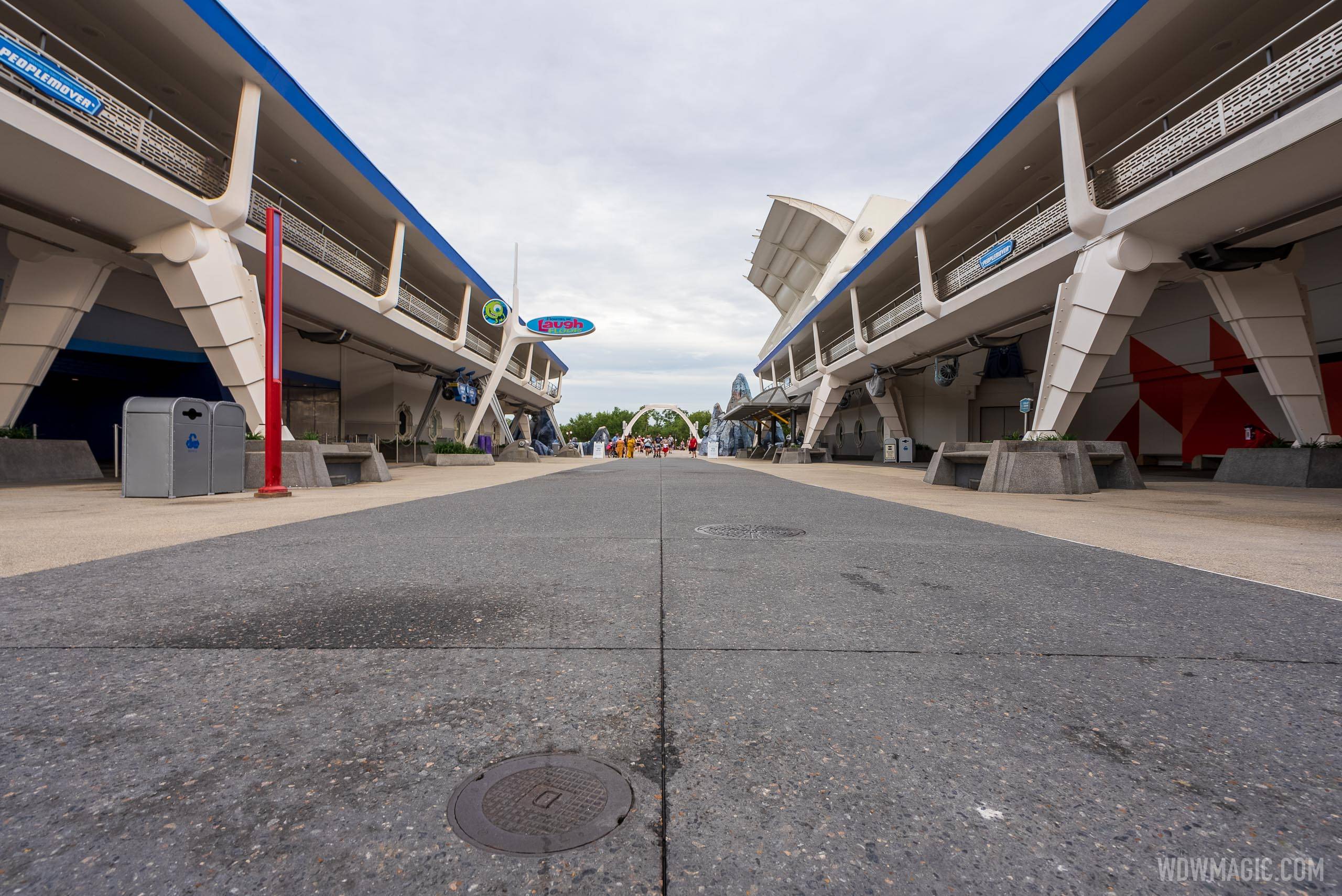 Disney gives the main Magic Kingdom Tomorrowland walkway a much simpler look