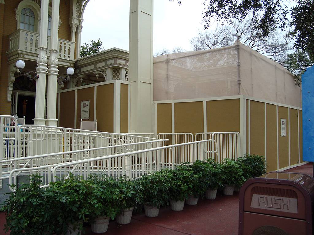 Construction walls appear outside the Town Square Exposition Hall - part of the meet and greet relocation project?
