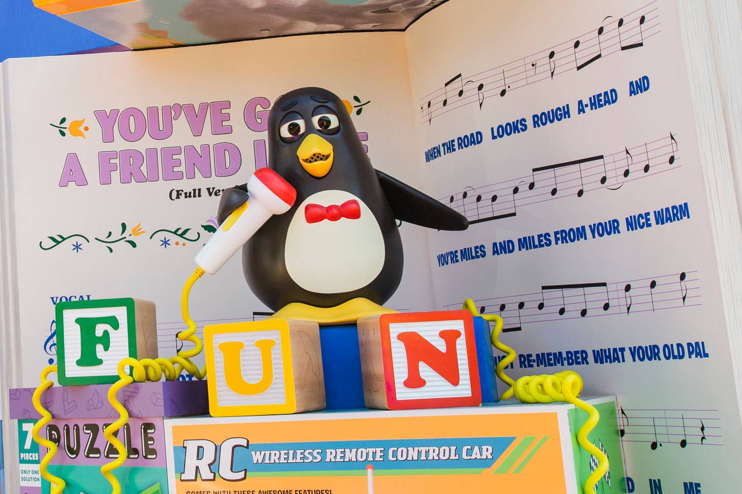 The Audio-Animatronic Wheezy figure serenades guests with You've Got a Friend in Me