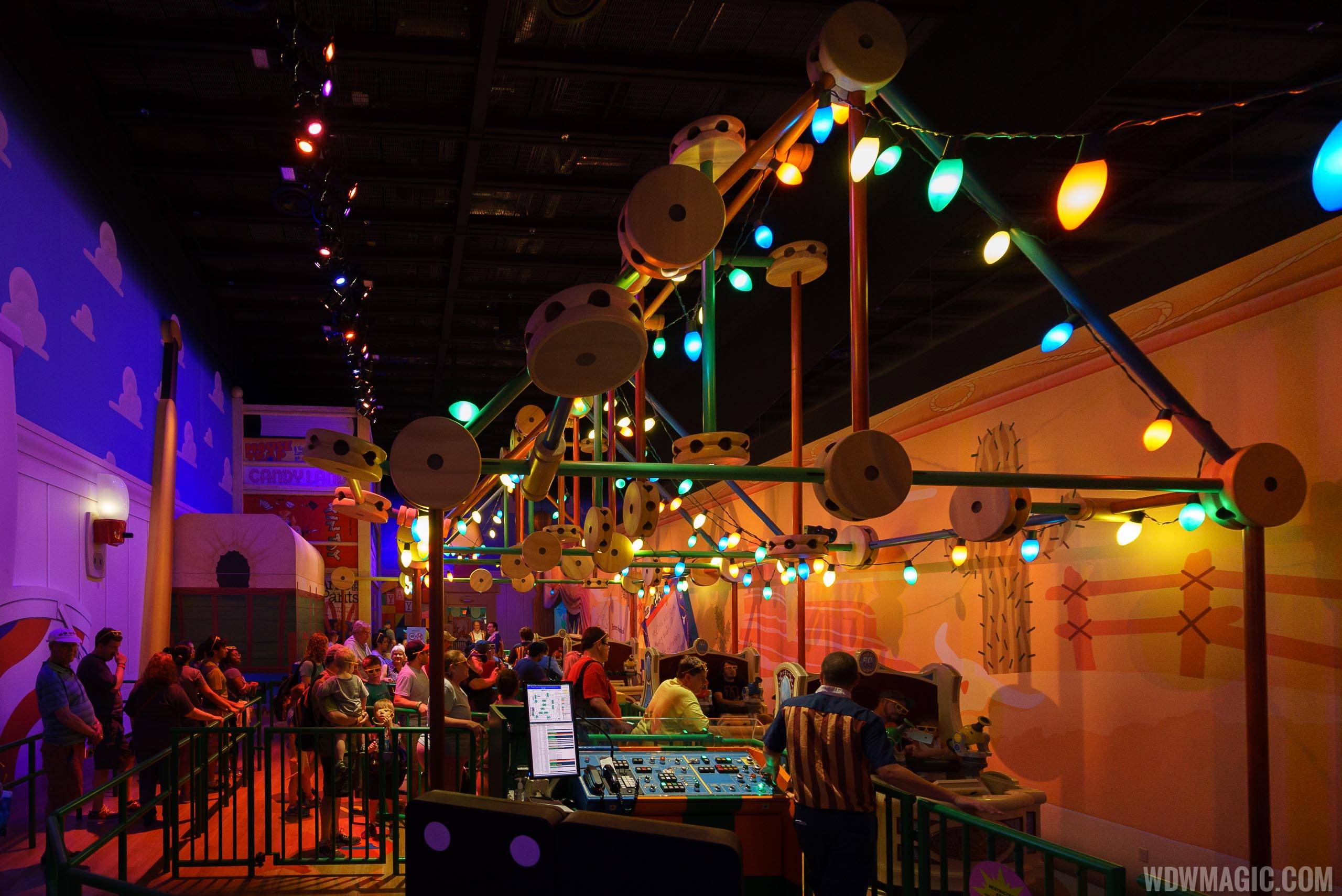 PHOTOS - Disney cuts wait times at Toy Story Mania with the opening of a third track