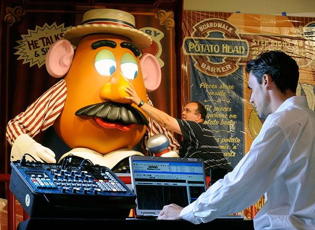 Photos of Imagineering programming the Mr Potato Head animatronic figure