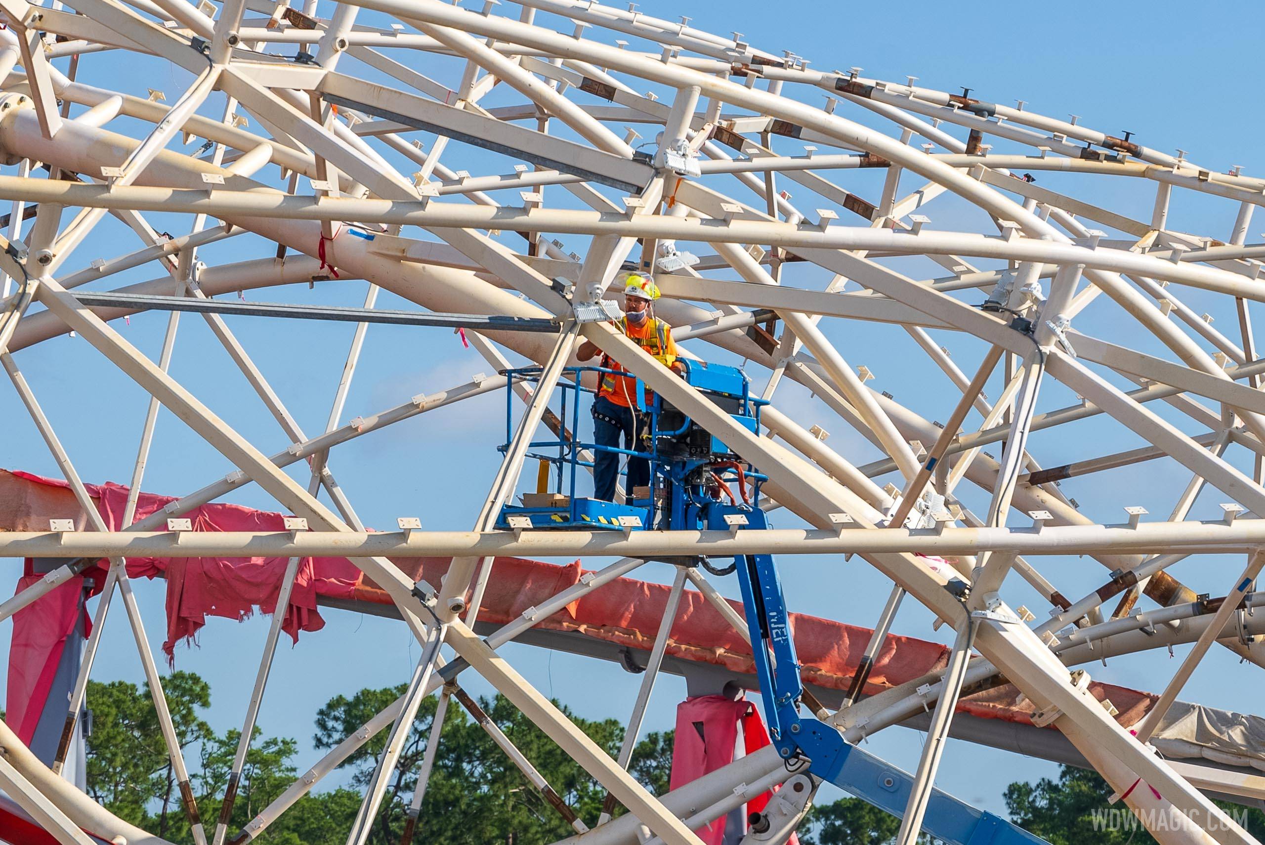Lighting systems being installed in the canopy at TRON Lightcyle Run