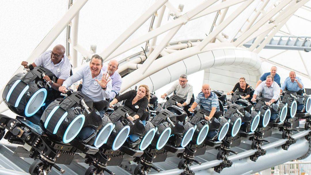 Disney World President Jeff Vahle rides TRON Lightcycle Run at Magic Kingdom