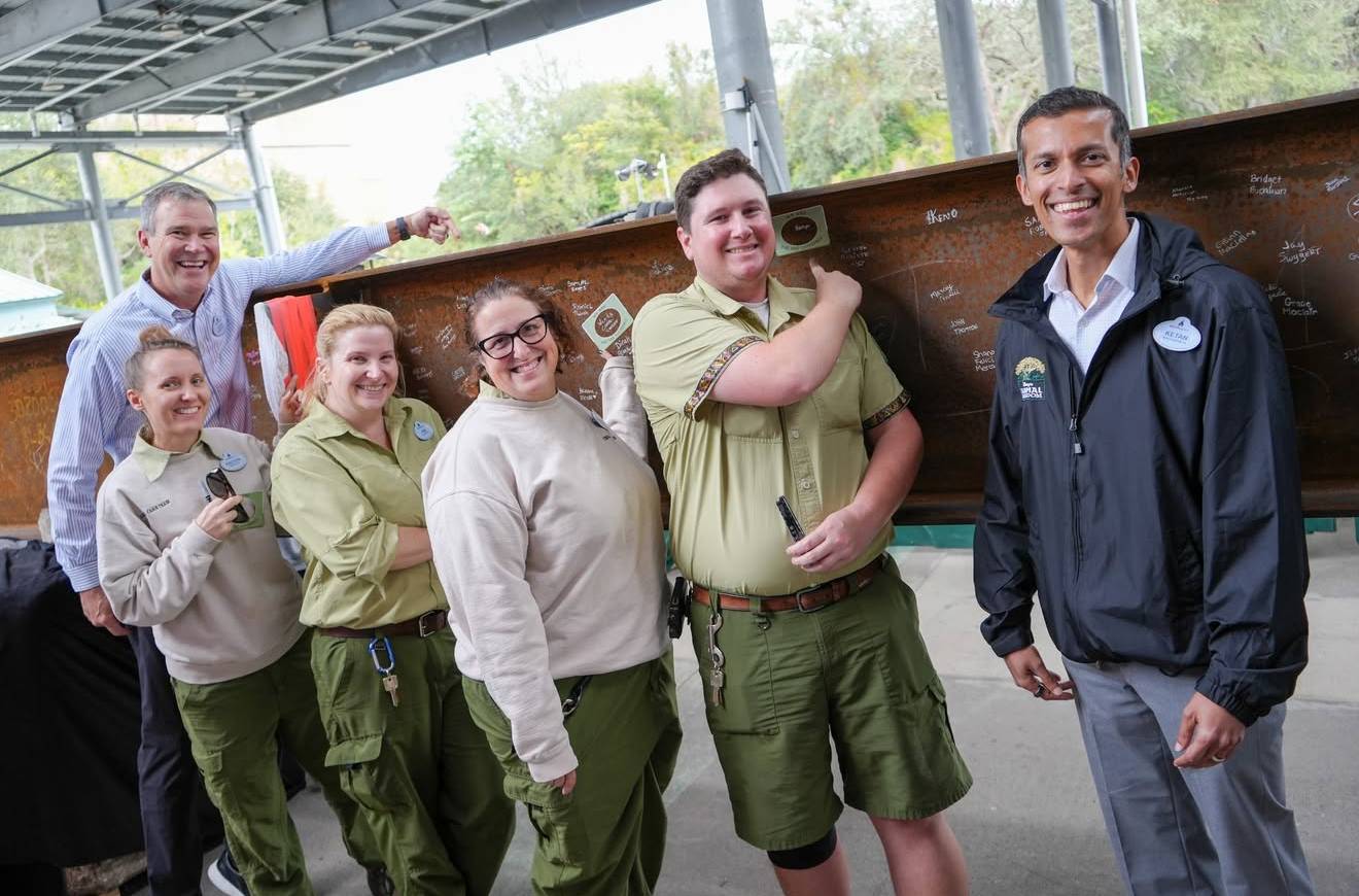 Disney's Animal Kingdom Cast Signing Steel Beam for Encanto Show Building