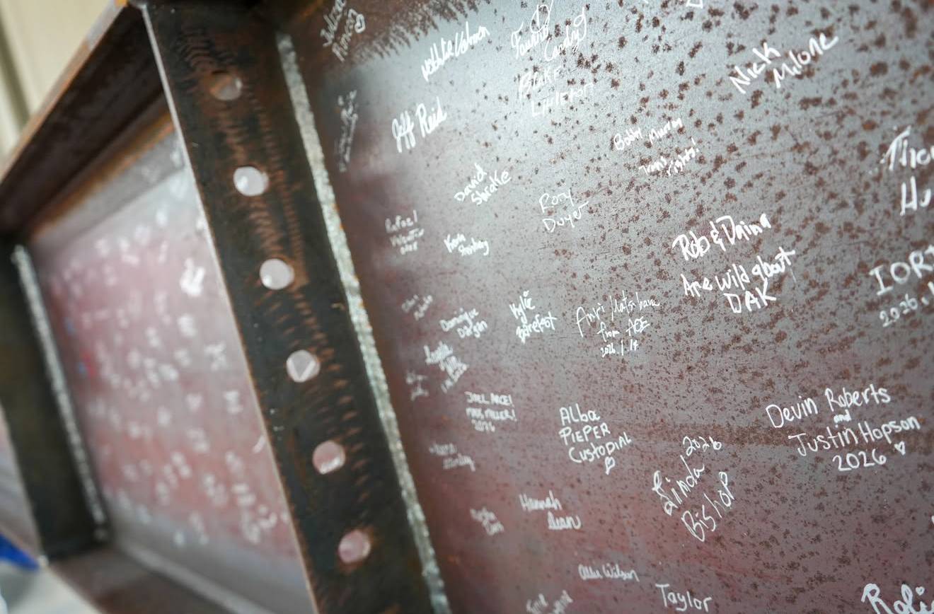 Disney's Animal Kingdom Cast Signing Steel Beam for Encanto Show Building