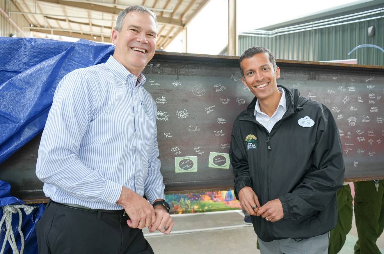 Disney's Animal Kingdom Cast Signing Steel Beam for Encanto Show Building